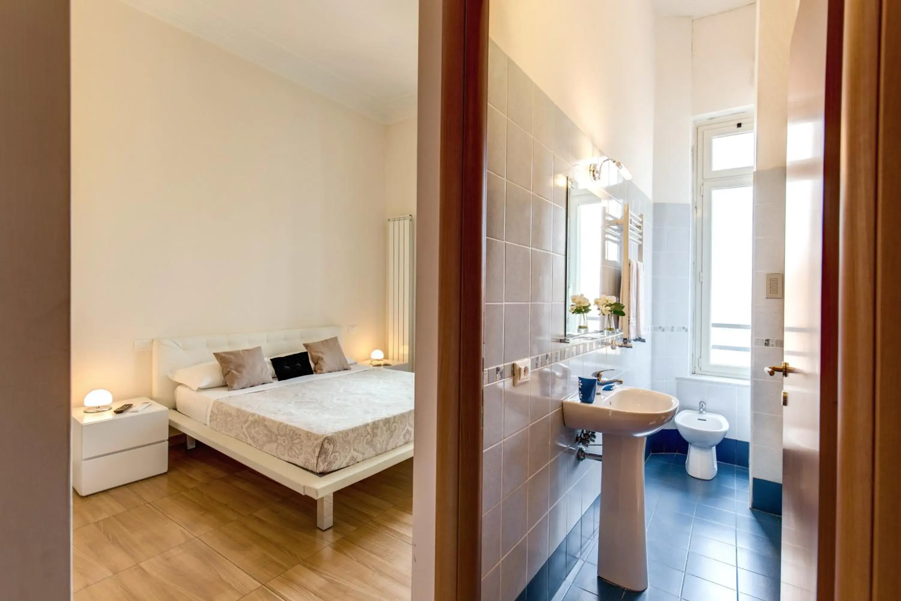Bed, Bathroom in Bon Ton Suite