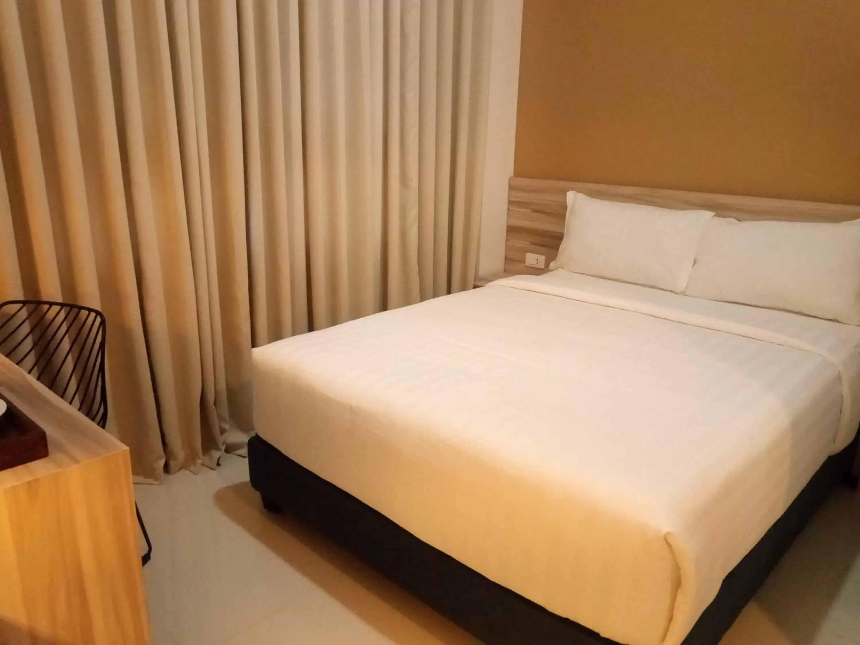 Bed in Figtree Hotel