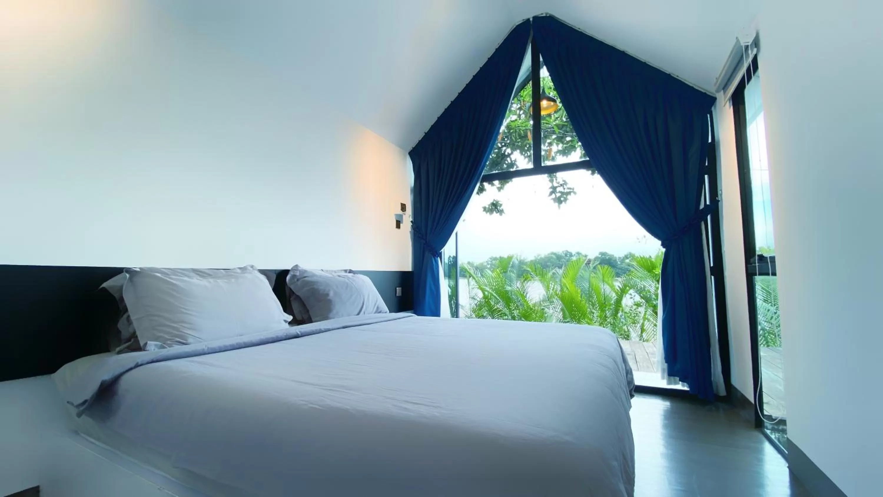 Bed in Kampot Riverfront Boutique