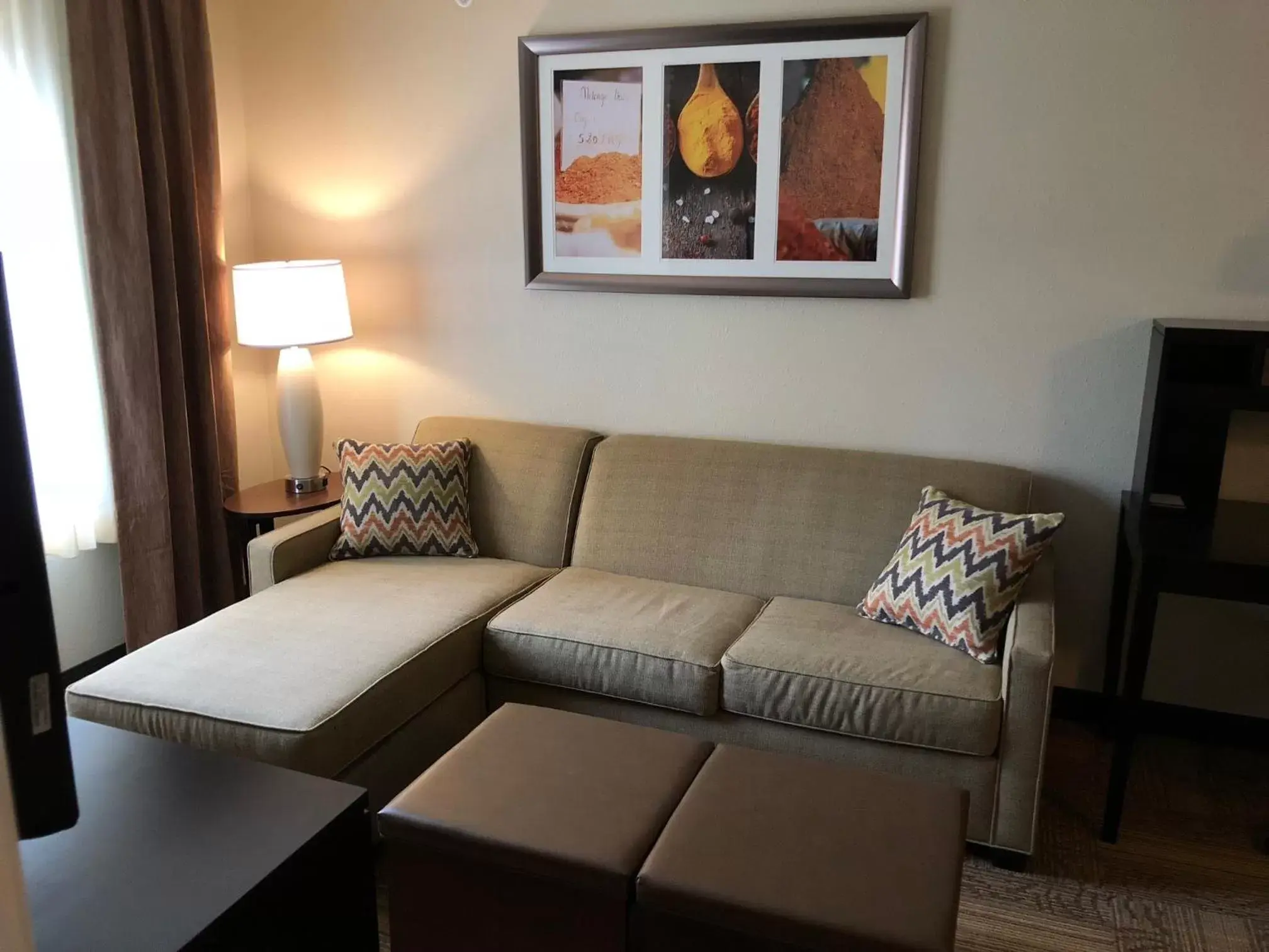Living room, Seating Area in Staybridge Suites Grand Rapids-Kentwood, an IHG Hotel