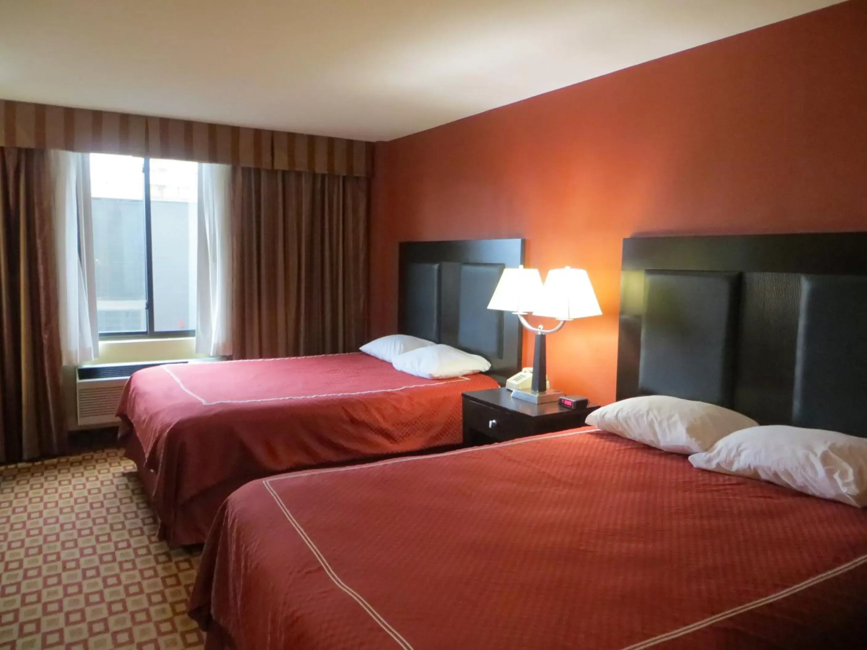 Bed in Super 8 by Wyndham Chicago Northlake O'Hare South