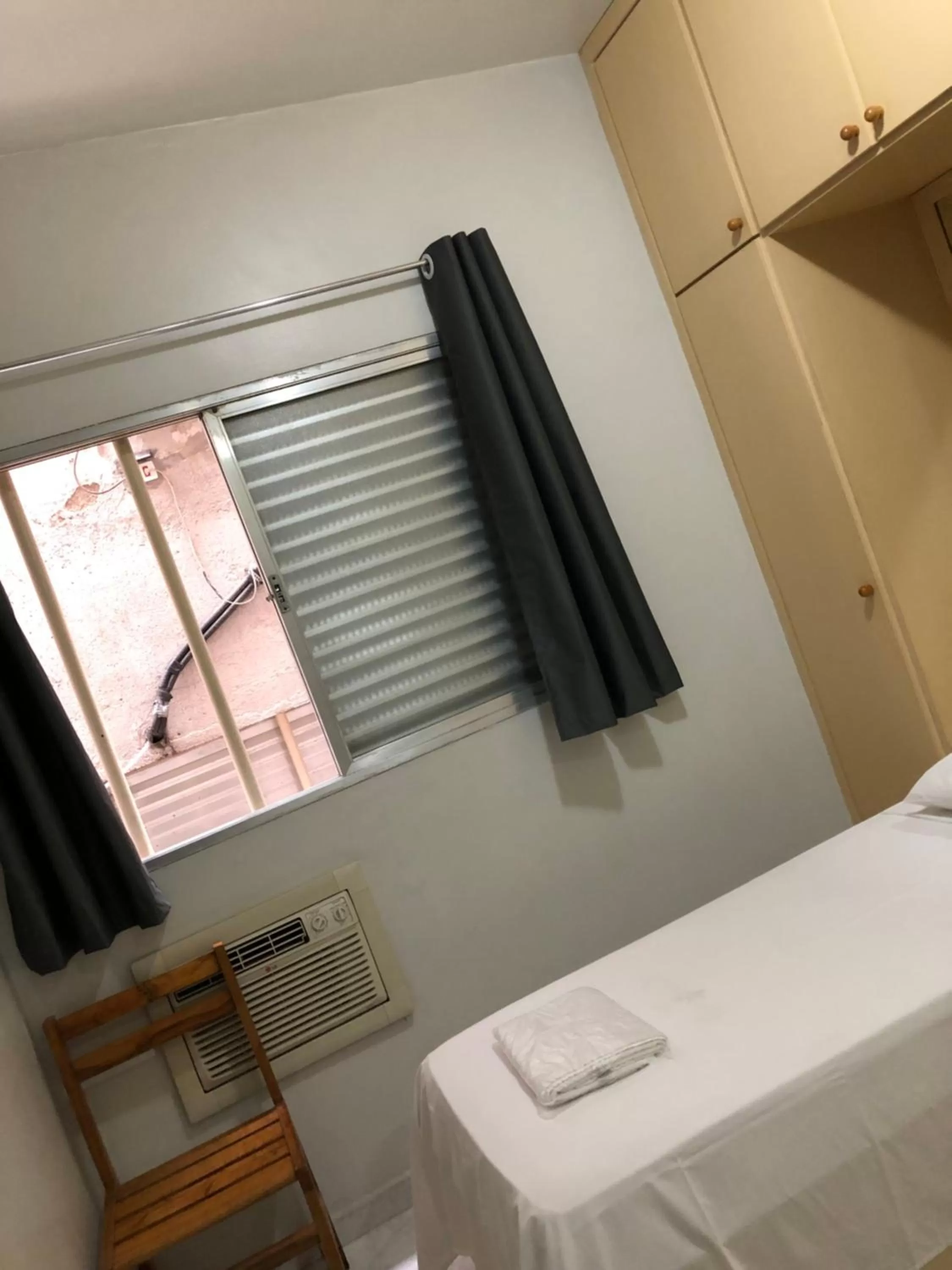 Bed in Center Plaza Hotel