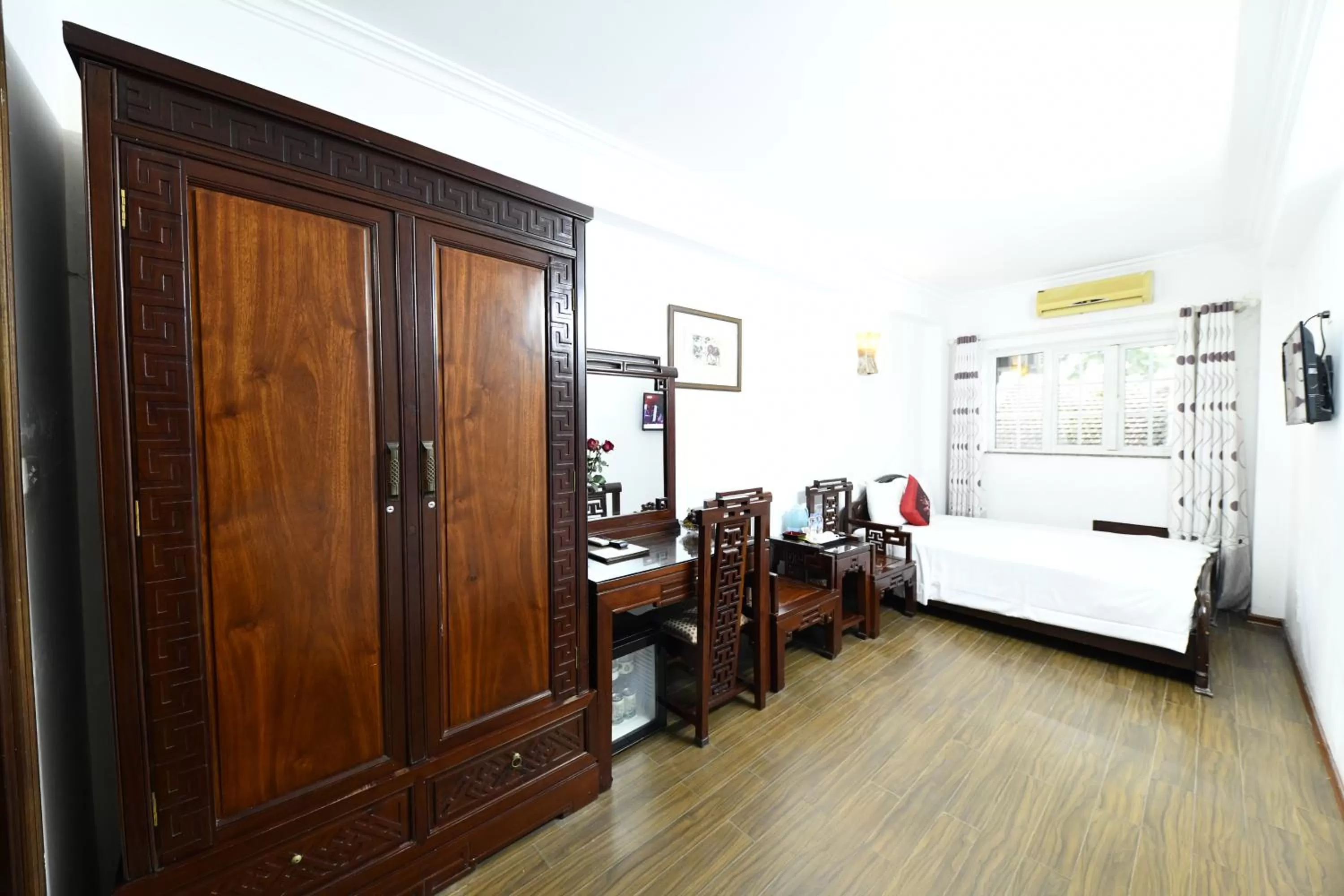 Bed in Phoenix Legend Hotel Hanoi