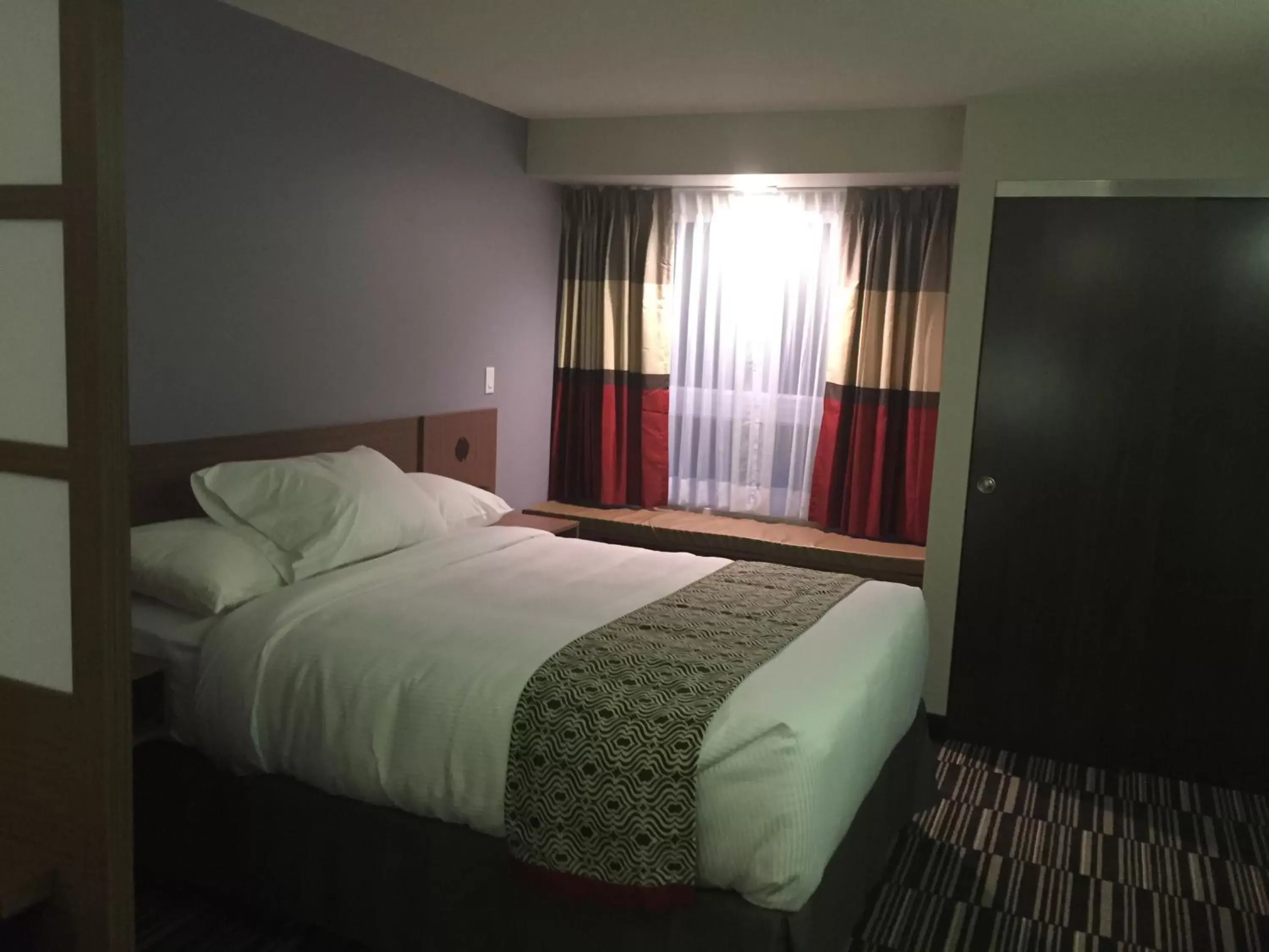 Photo of the whole room, Bed in Microtel Inn & Suites by Wyndham Kirkland Lake