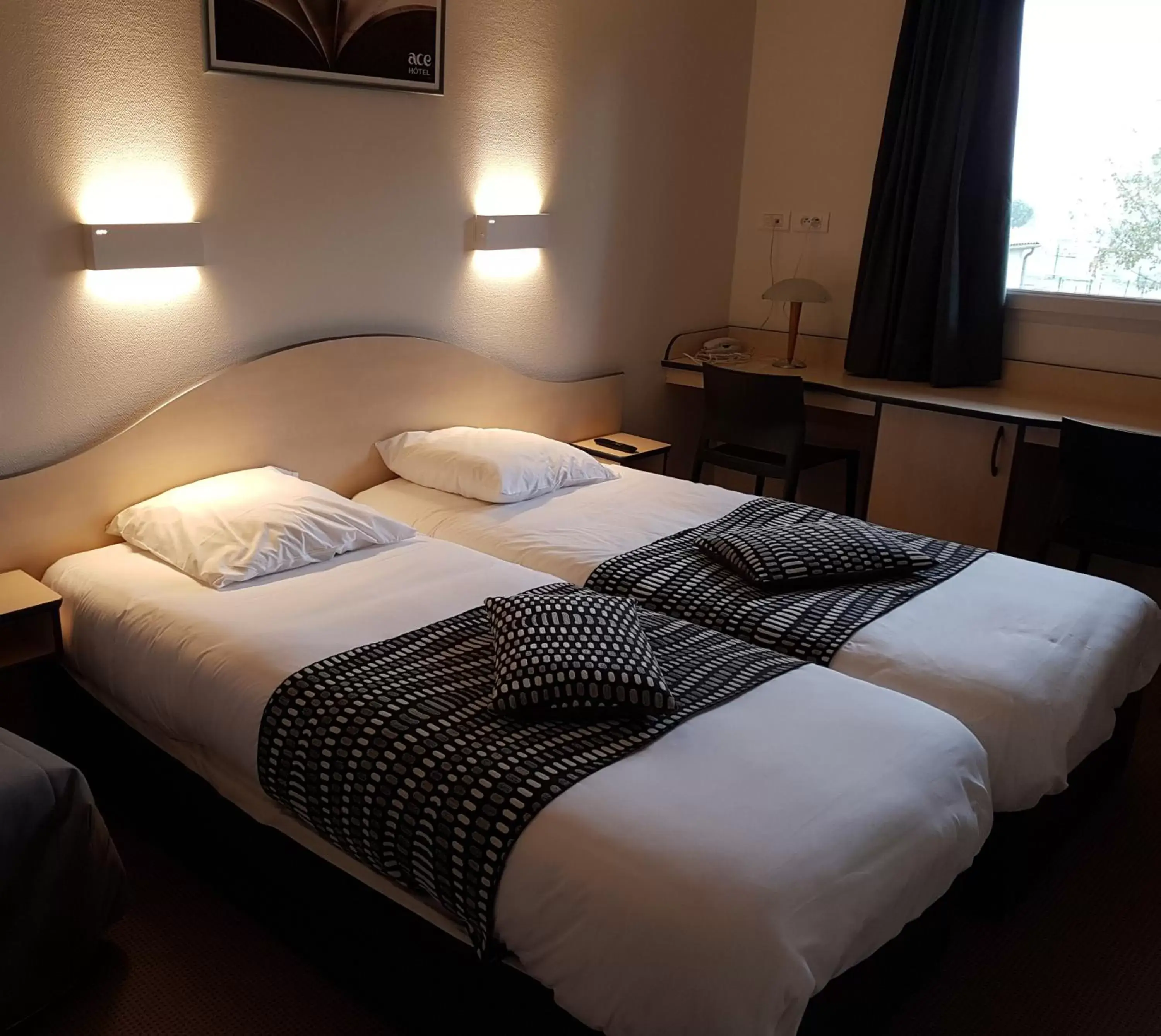 Photo of the whole room, Bed in ACE Hôtel Vendée Saint Hermine