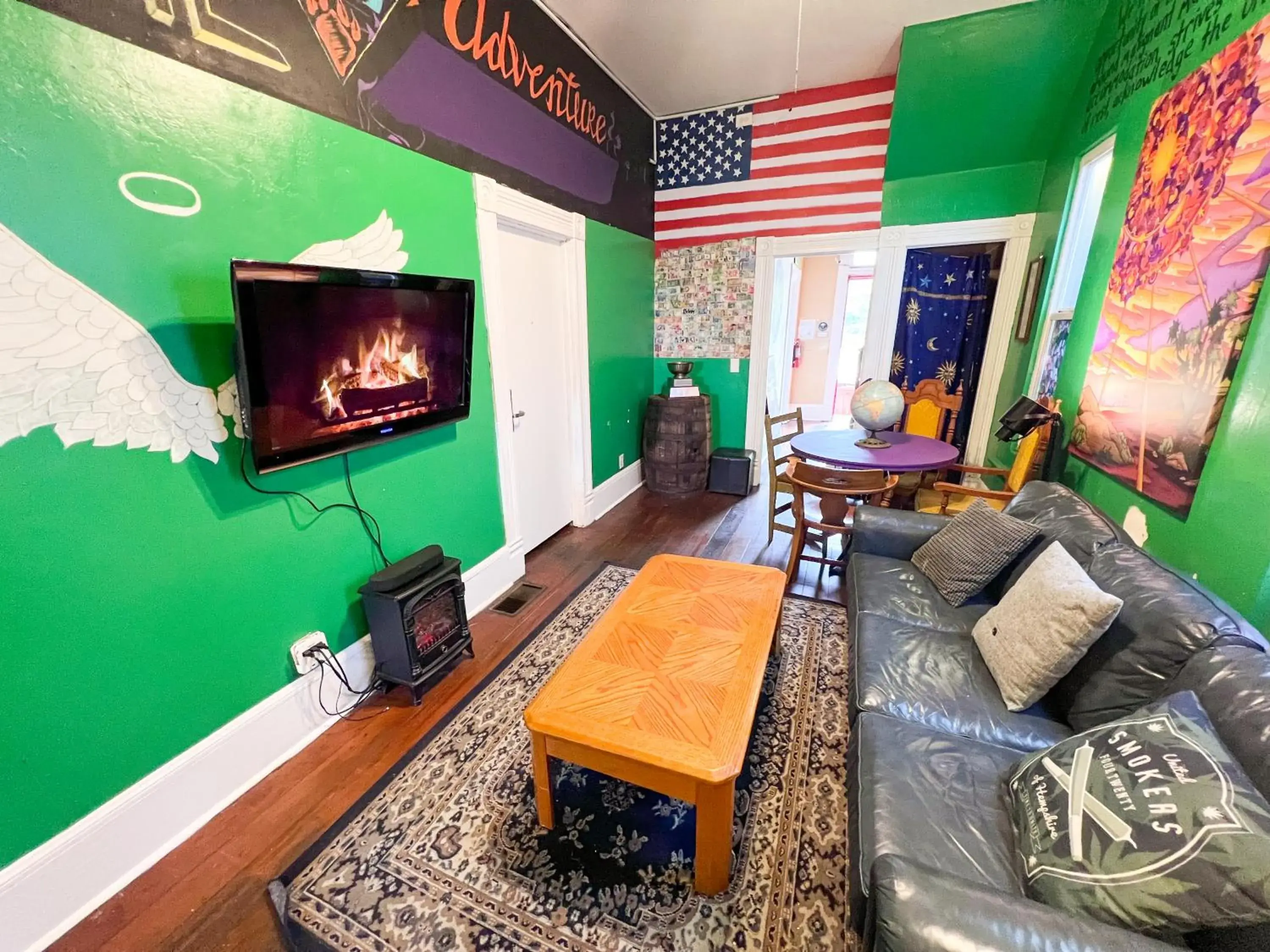 Living room, TV/Entertainment Center in International Travelers House Adventure Hostel