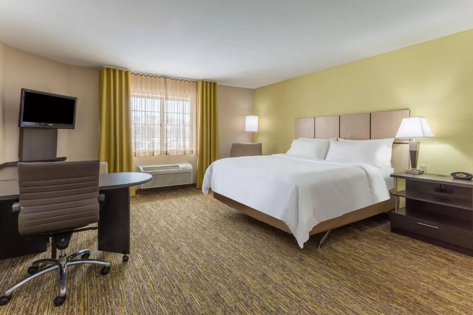 Bedroom, Bed in Candlewood Suites South Bend Airport, an IHG Hotel