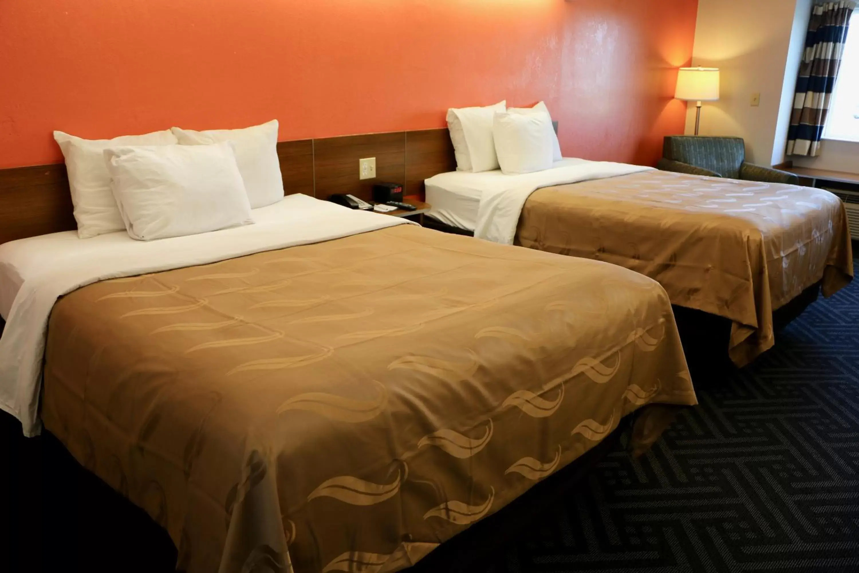 Bed in Quality Inn & Suites Watertown Fort Drum