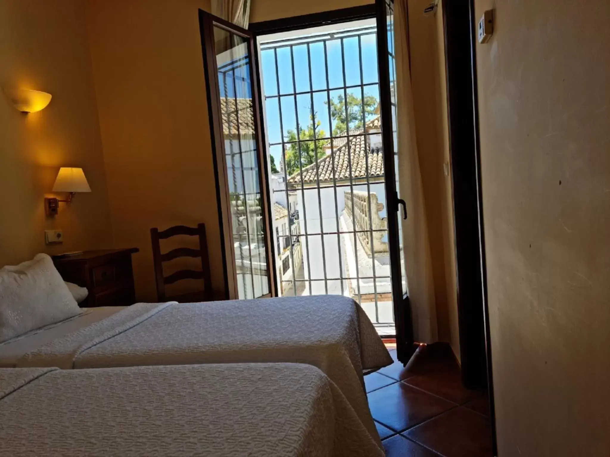 Balcony/Terrace, Bed in Hotel Plateros