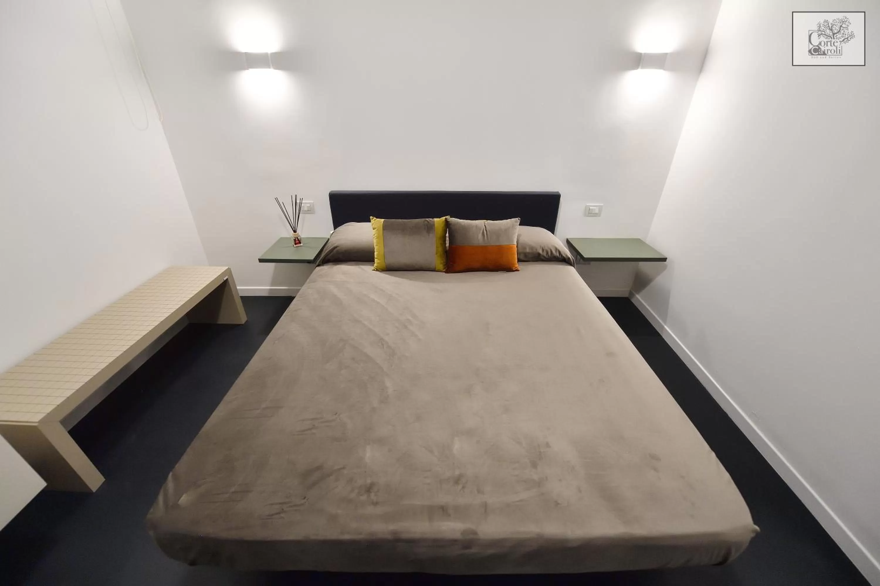 Bed in Corte Cairoli B&B and Suites