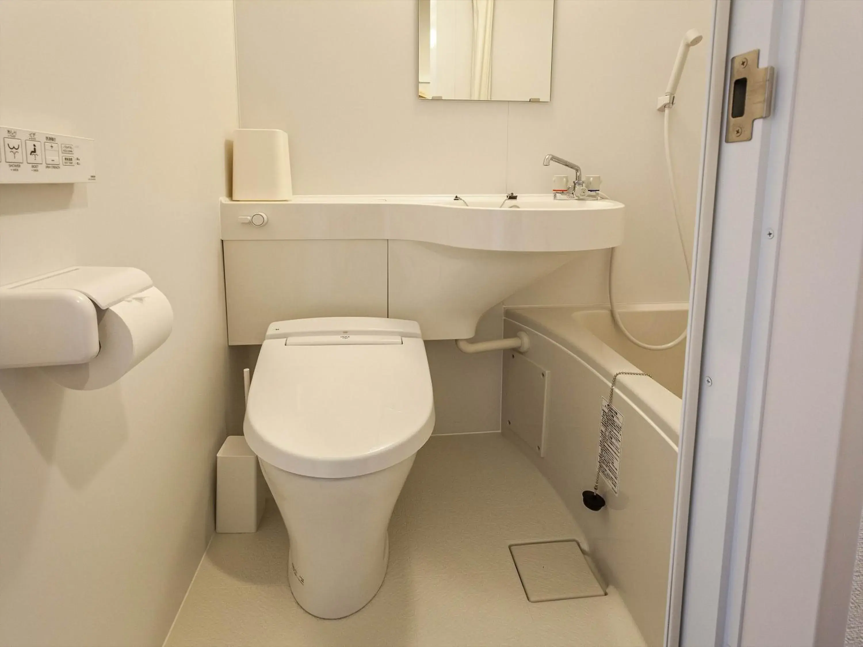 Bathroom in Kariyushi COndominium Resort Naha Living Inn Asahibashiekimae Annex and Premier