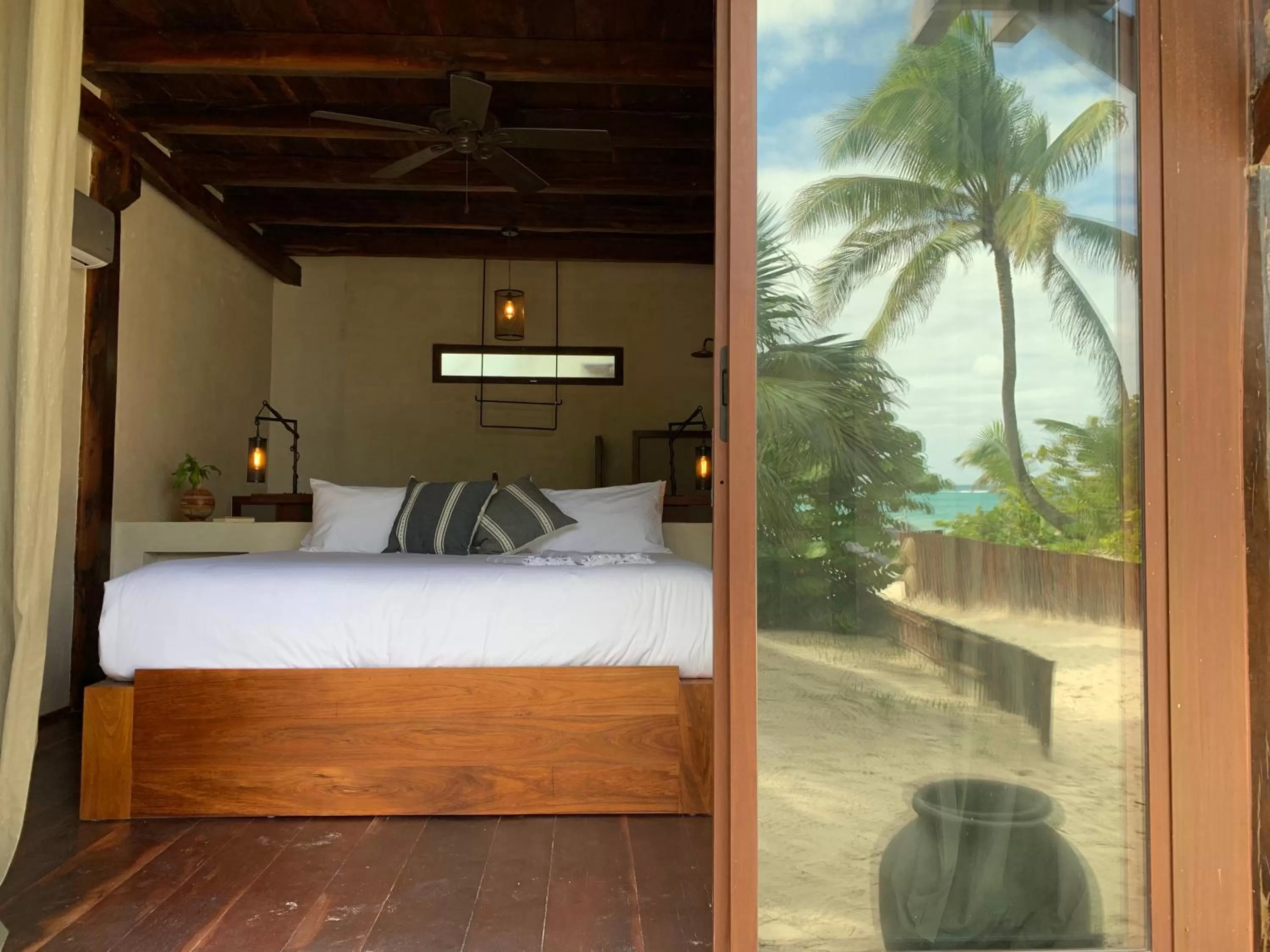 Bed in Libelula Tulum Beachfront Hotel