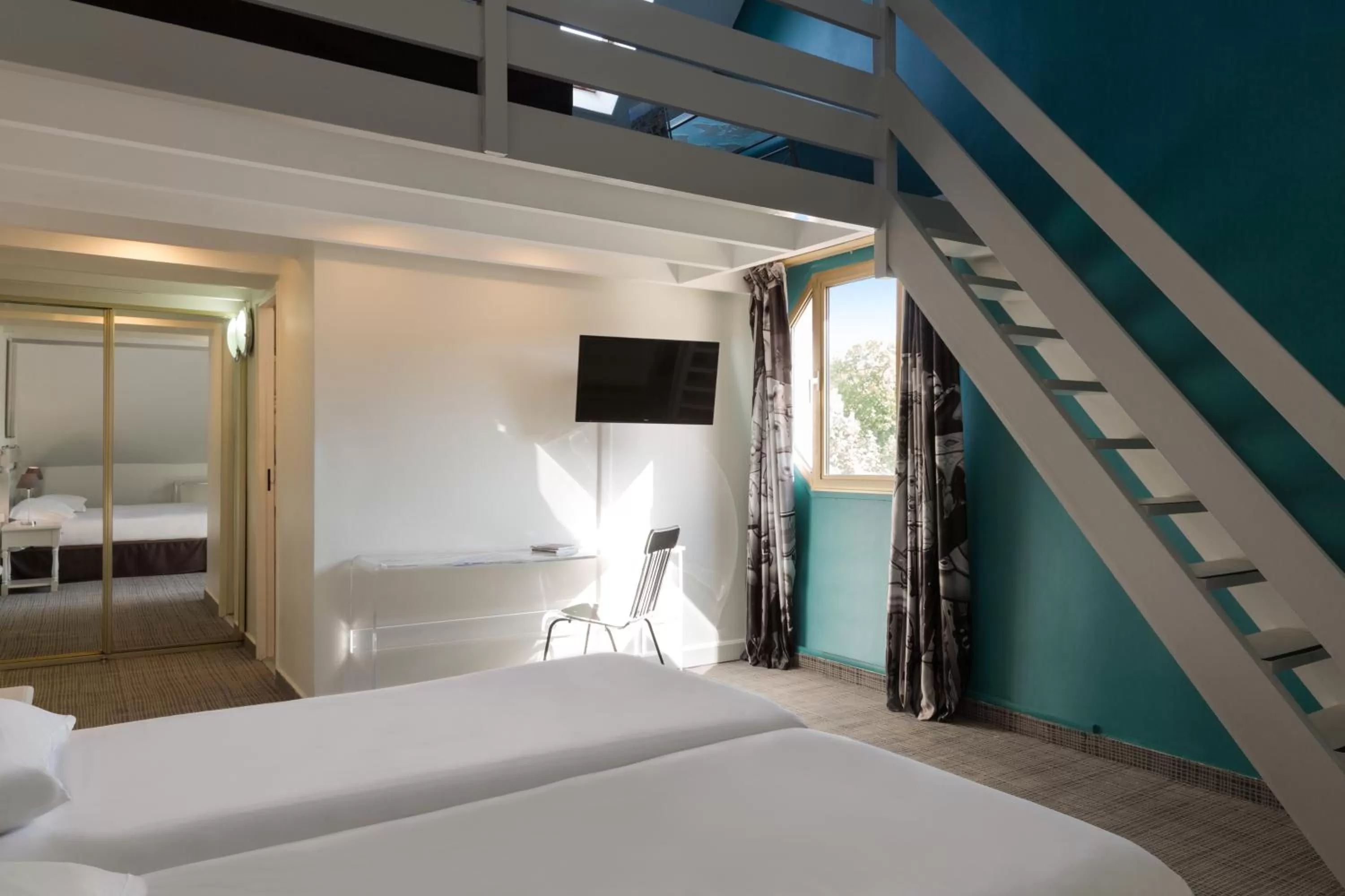 Photo of the whole room, Bed in Hotel Le Cardinal Rueil Centre