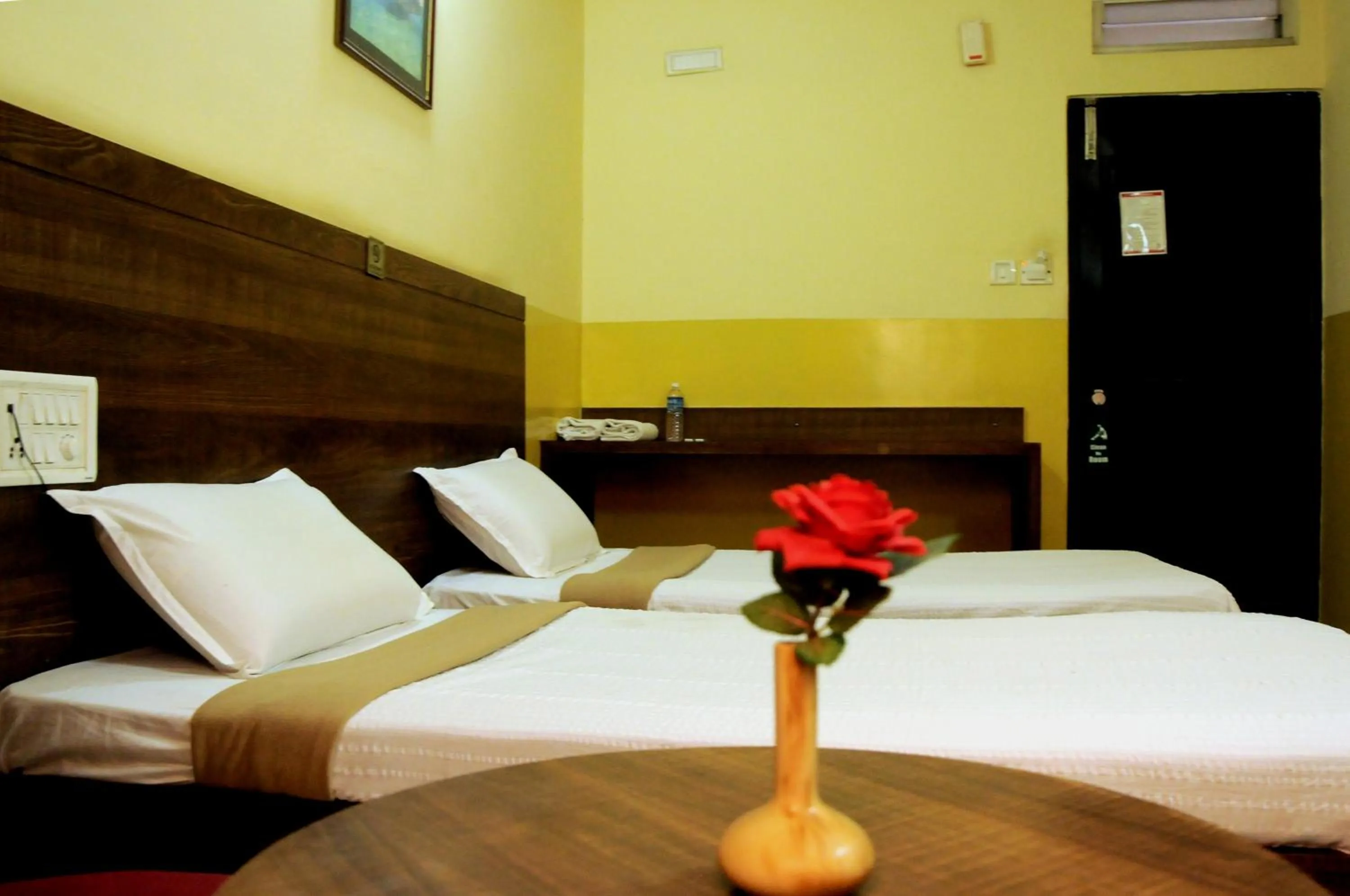 Bed in Suvarna Residency