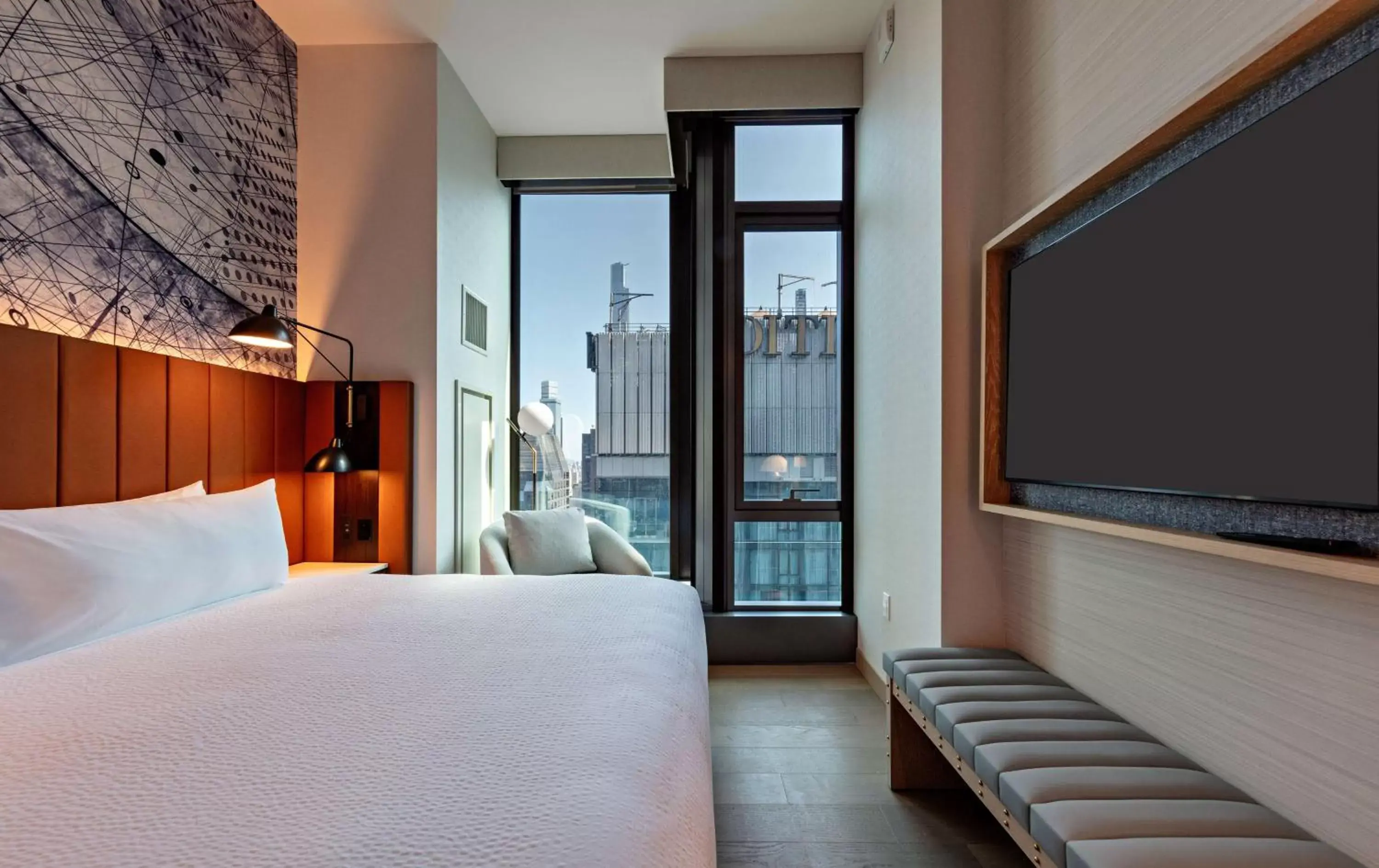 Bed, TV/Entertainment Center in Tempo By Hilton New York Times Square