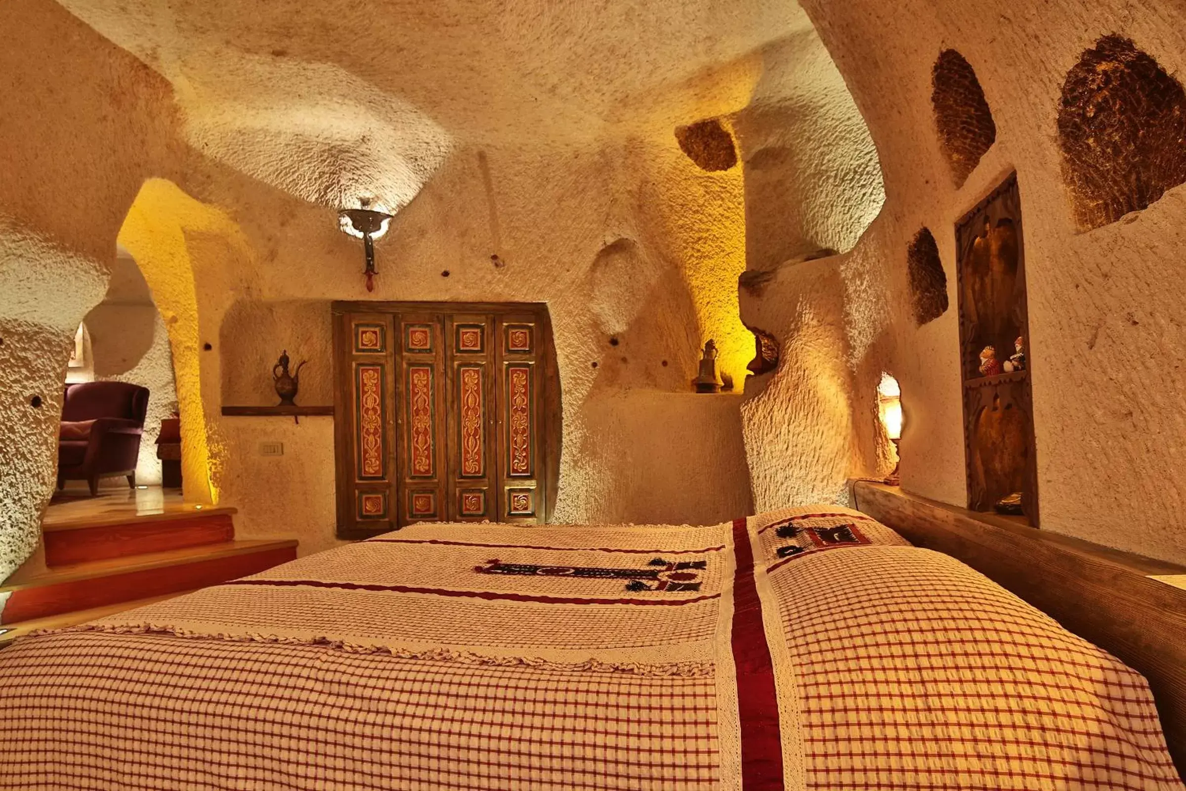 Living room, Bed in Cappadocia Cave Suites