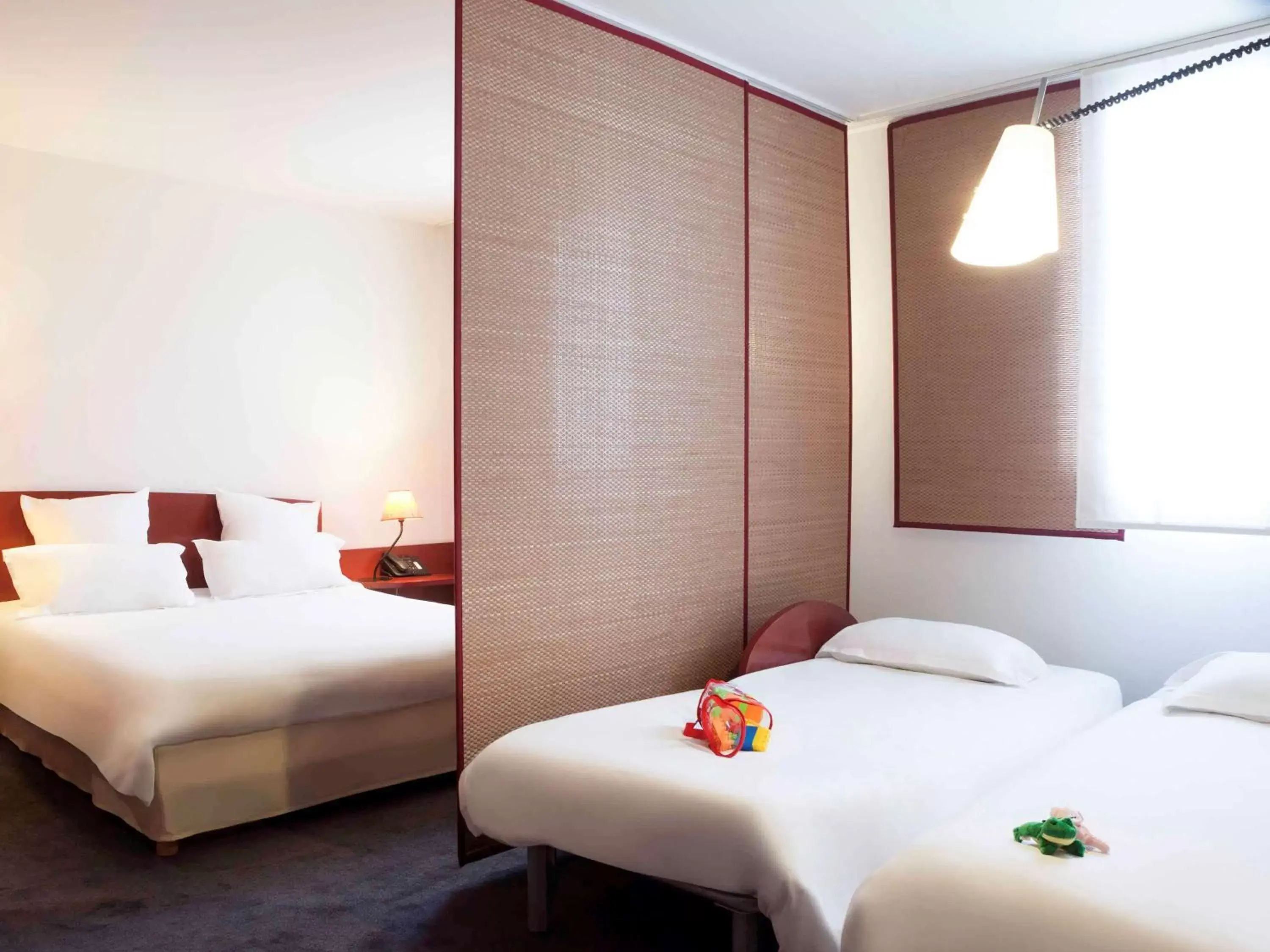 Photo of the whole room, Bed in Novotel Suites Rouen Normandie