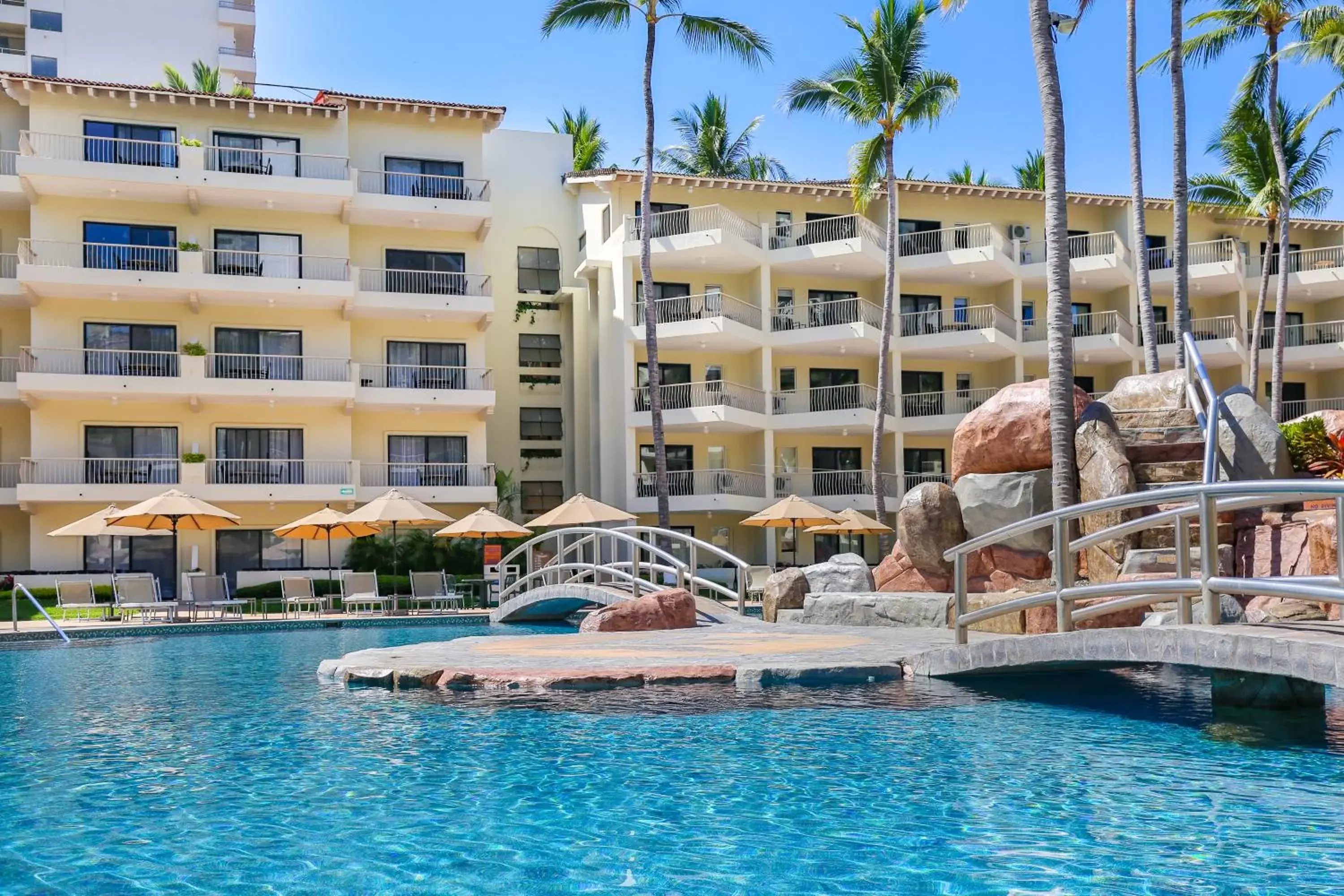 Swimming pool, Property Building in Villa del Palmar Beach Resort & Spa Puerto Vallarta