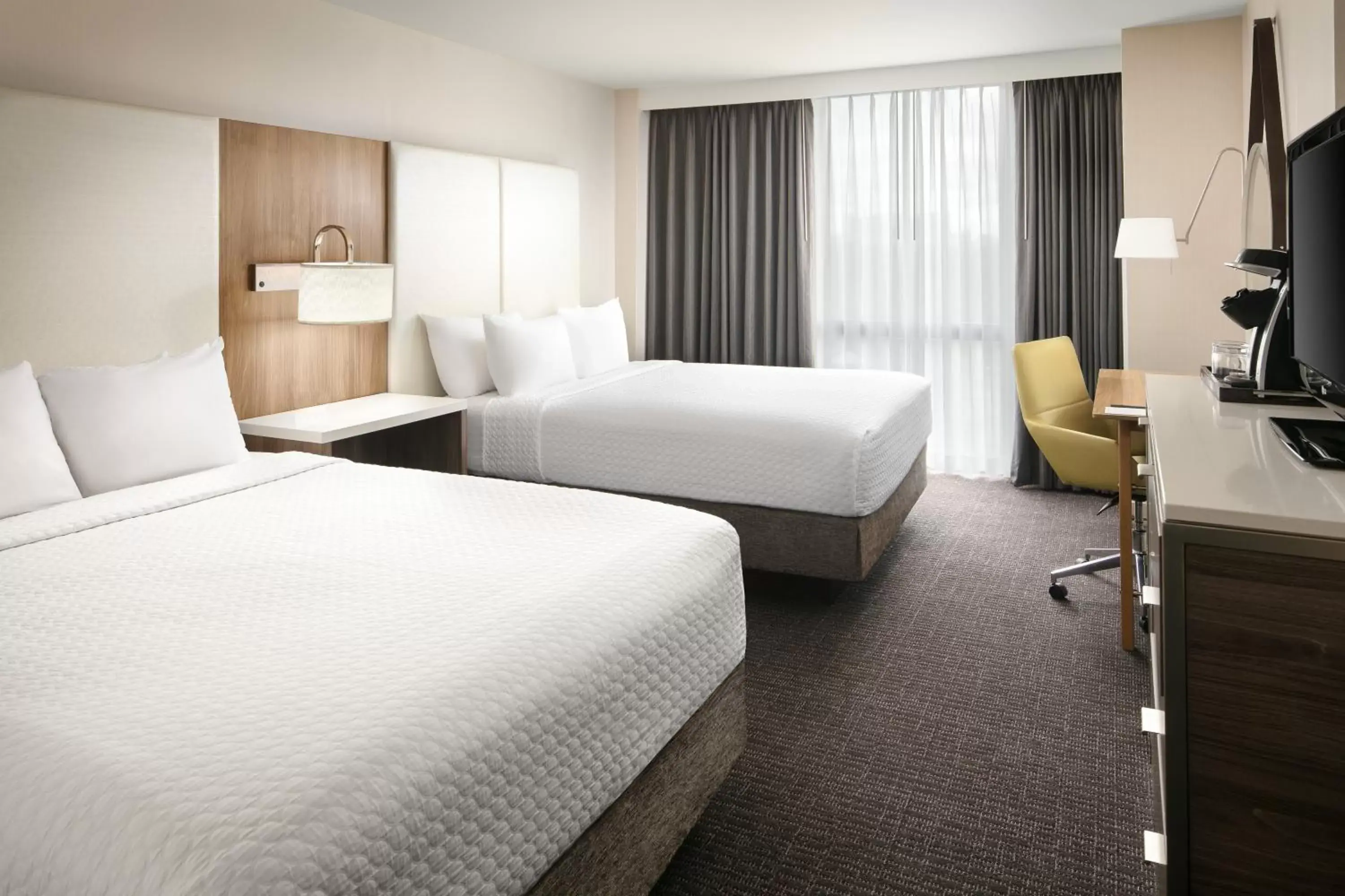 Photo of the whole room, Bed in Crowne Plaza Dallas Market Center, an IHG Hotel