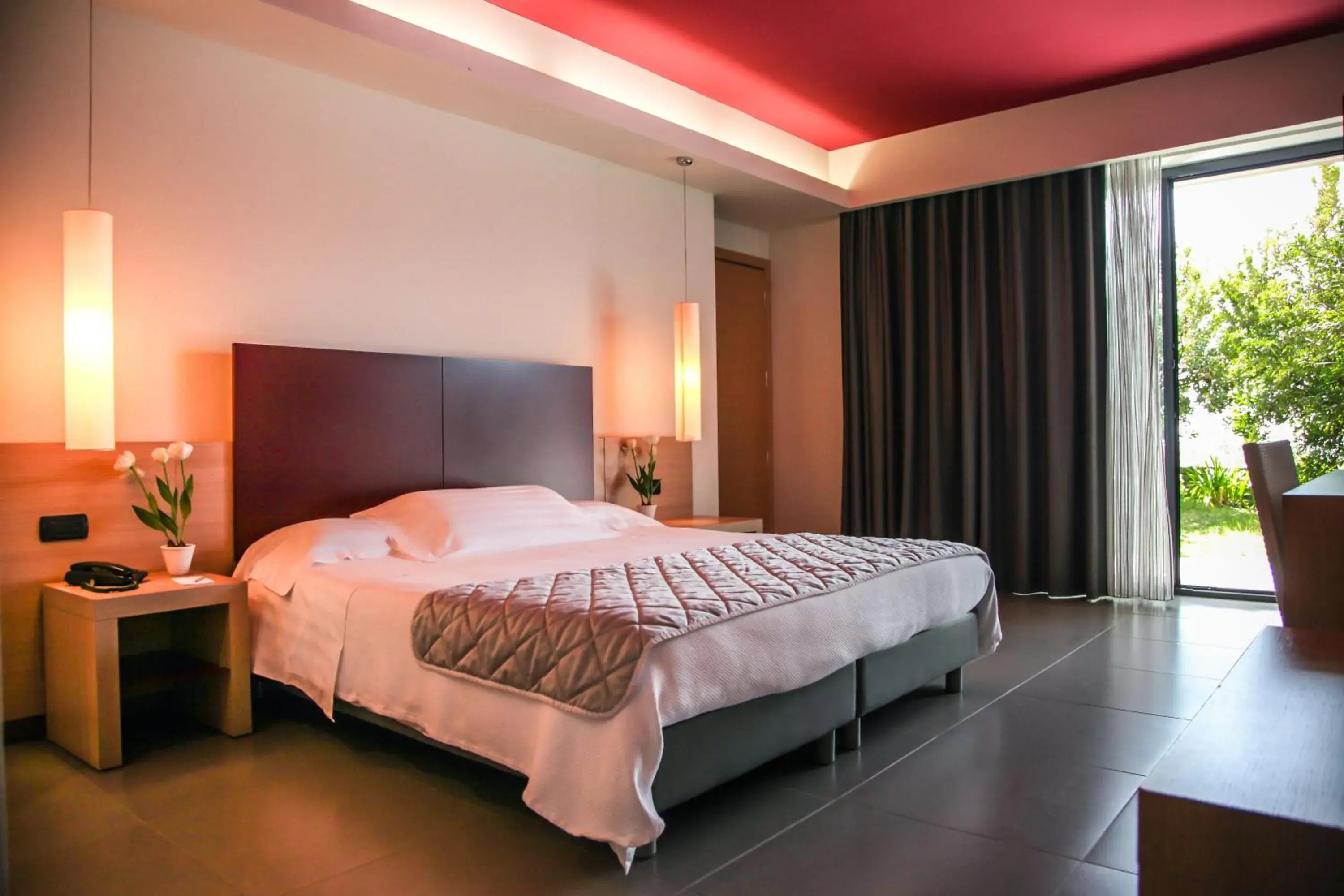 Bed in Esperia Palace Hotel & Resort Spa