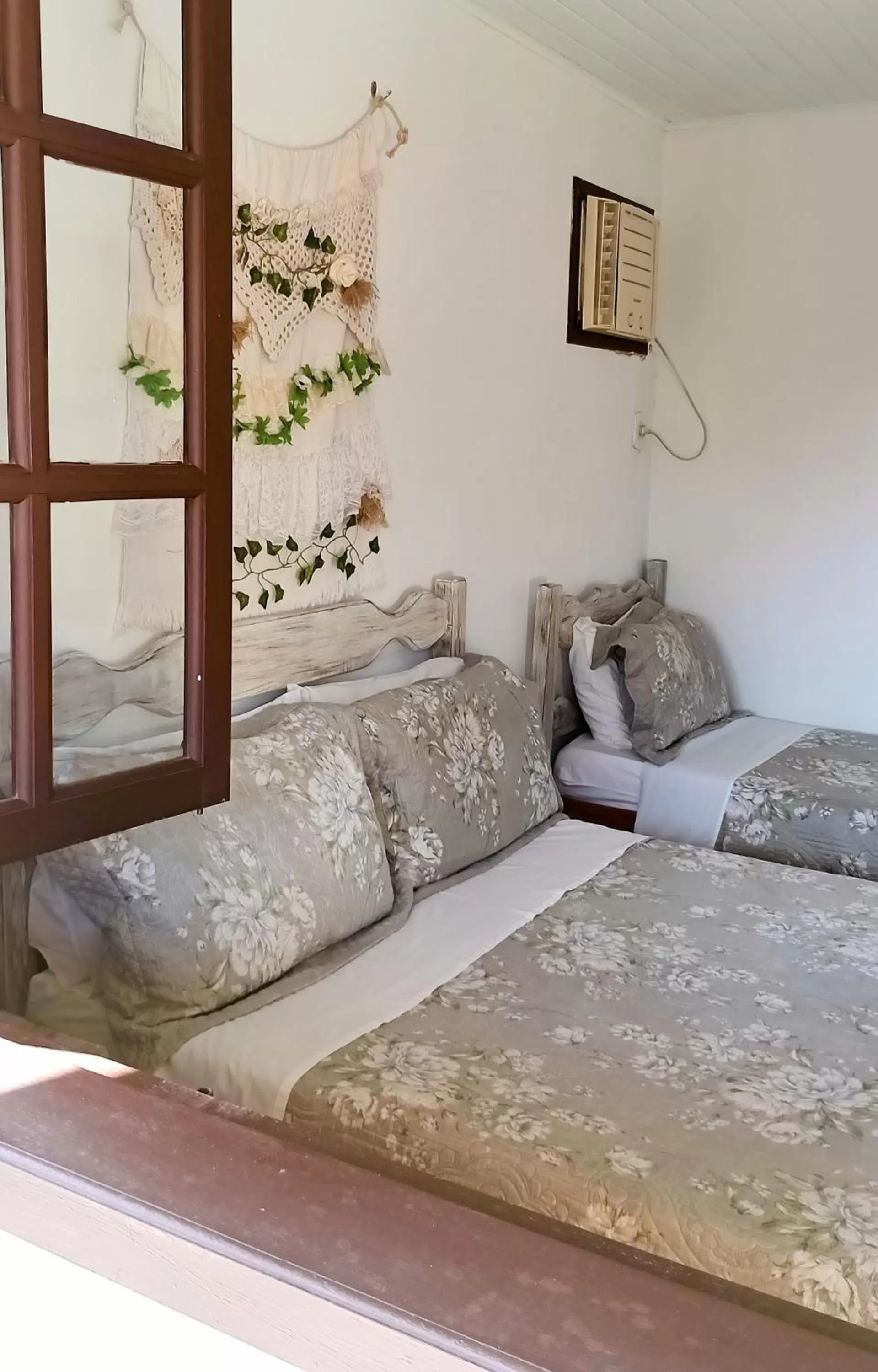 Bed in Hibiscos Pousada