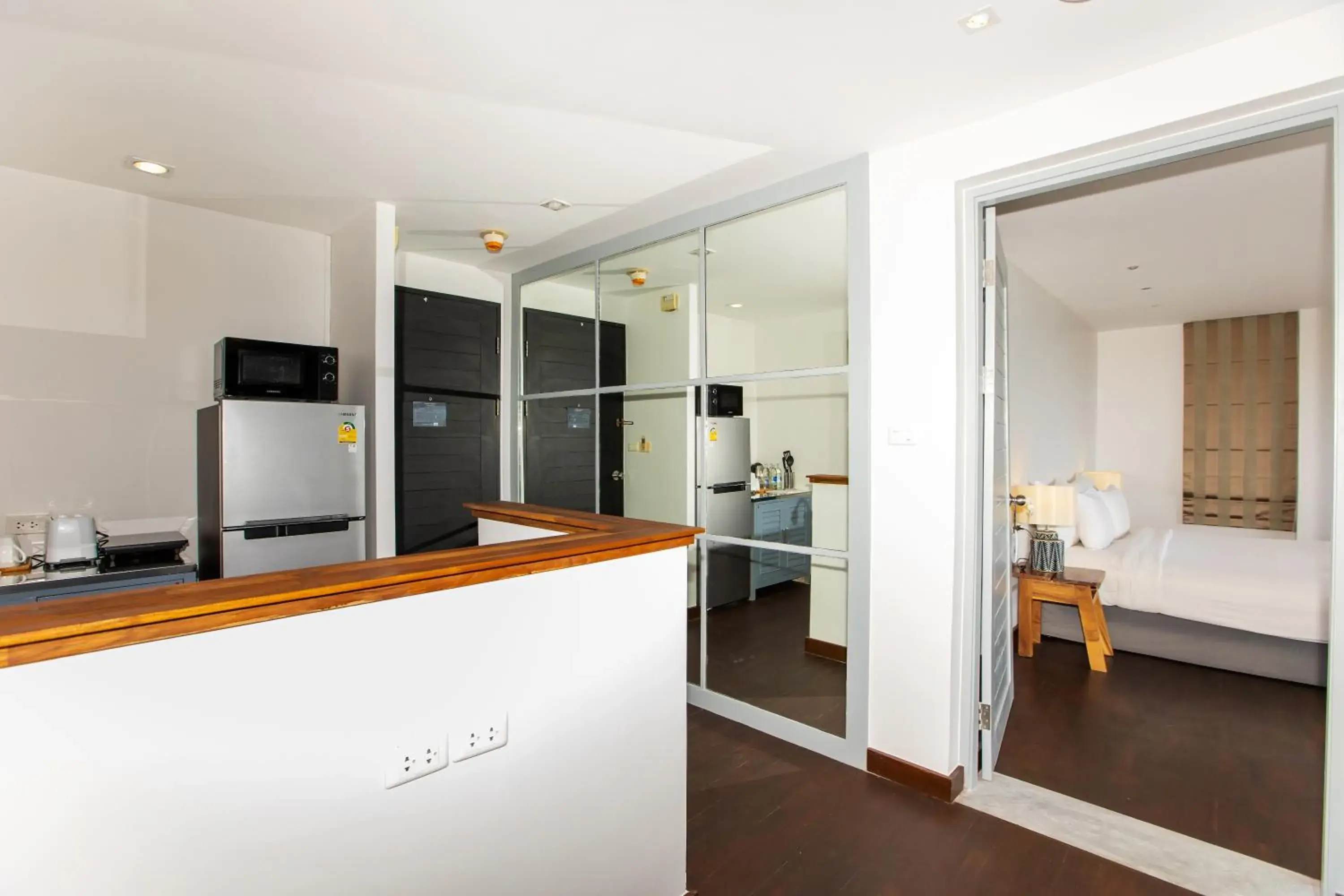 Kitchen or kitchenette in Mantra Samui Resort - SHA Extra Plus