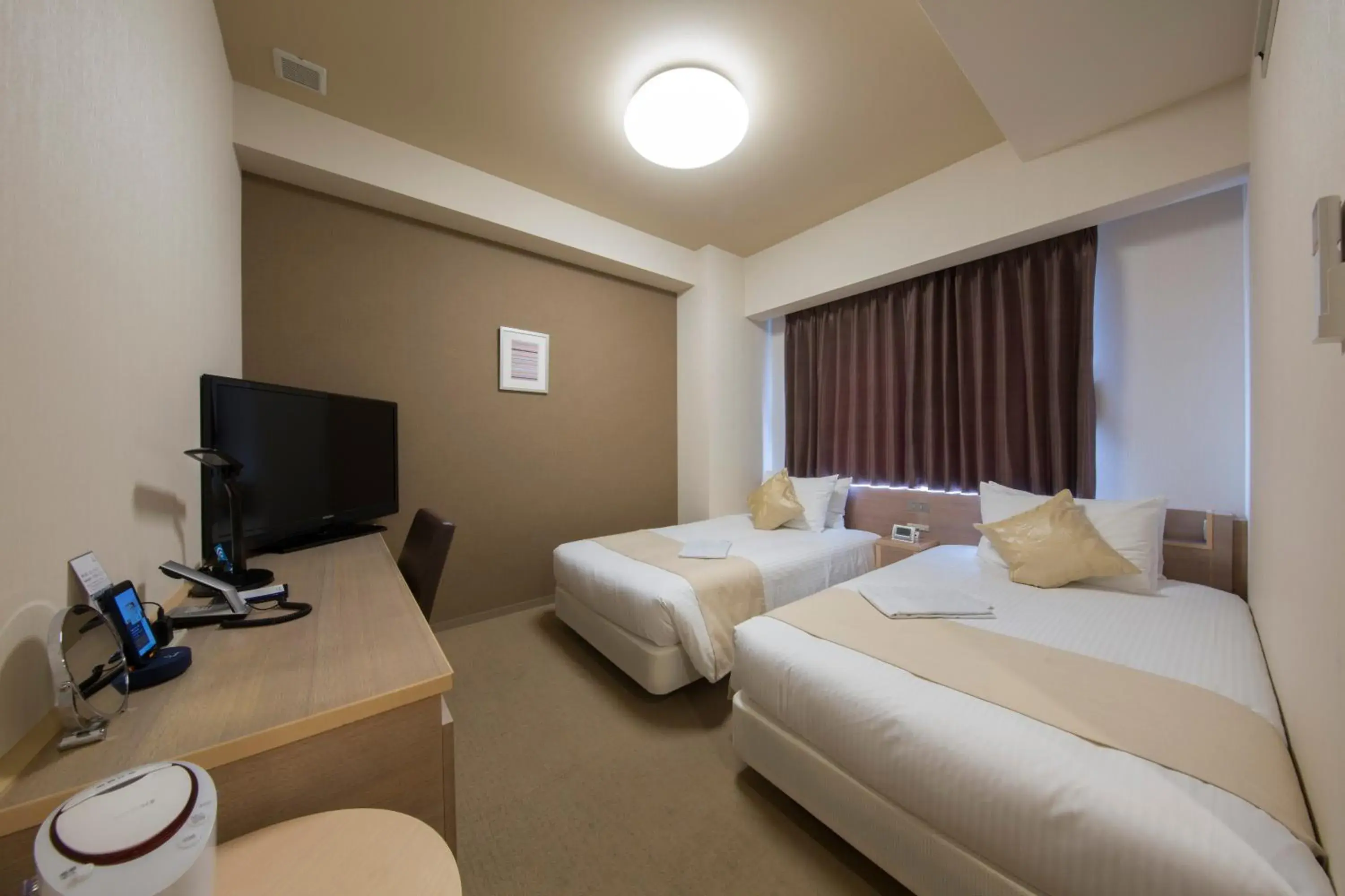 Photo of the whole room, TV/Entertainment Center in Shizutetsu Hotel Prezio Numazu