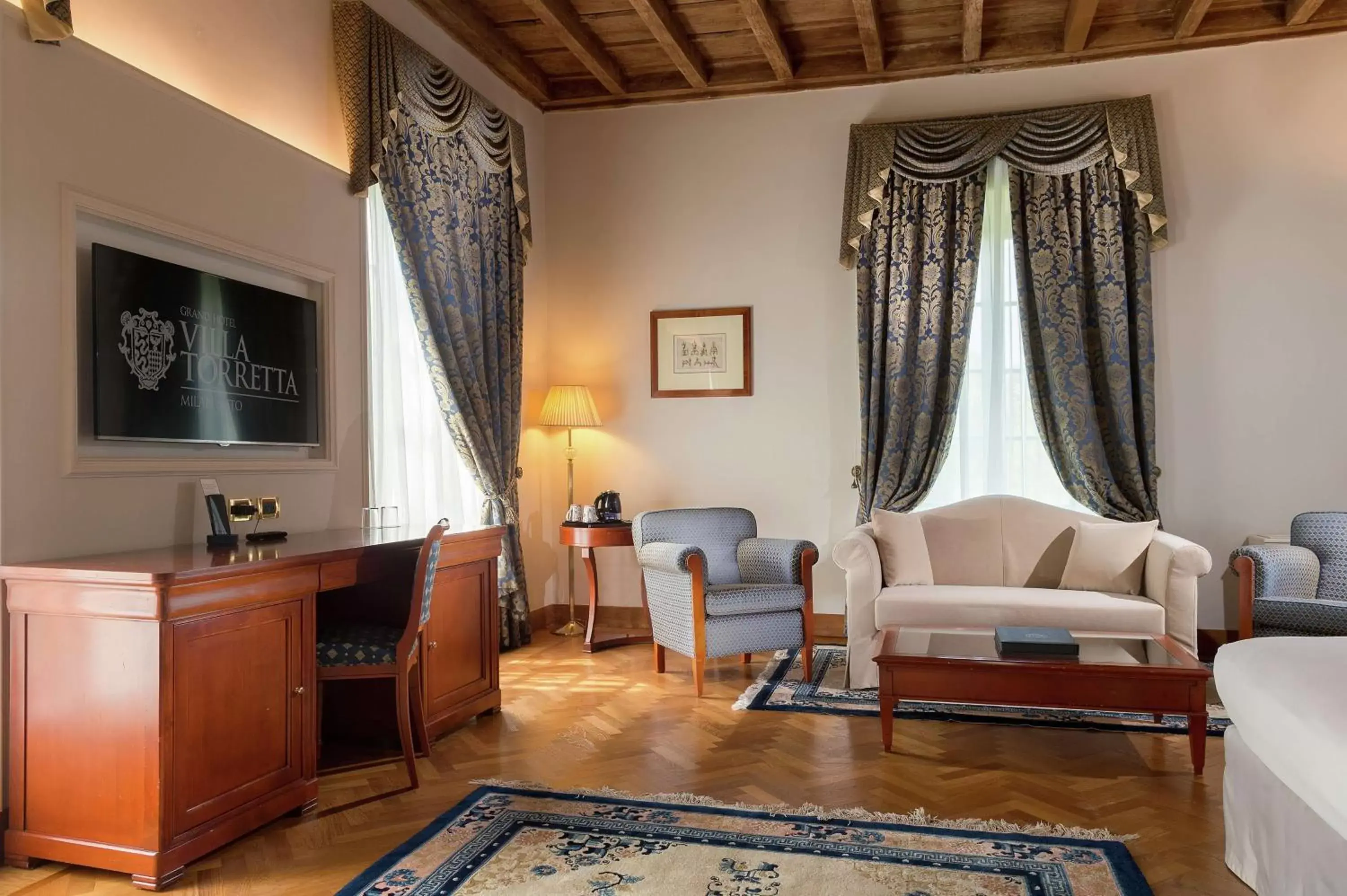 Bed, Seating Area in Grand Hotel Villa Torretta, Curio Collection by Hilton