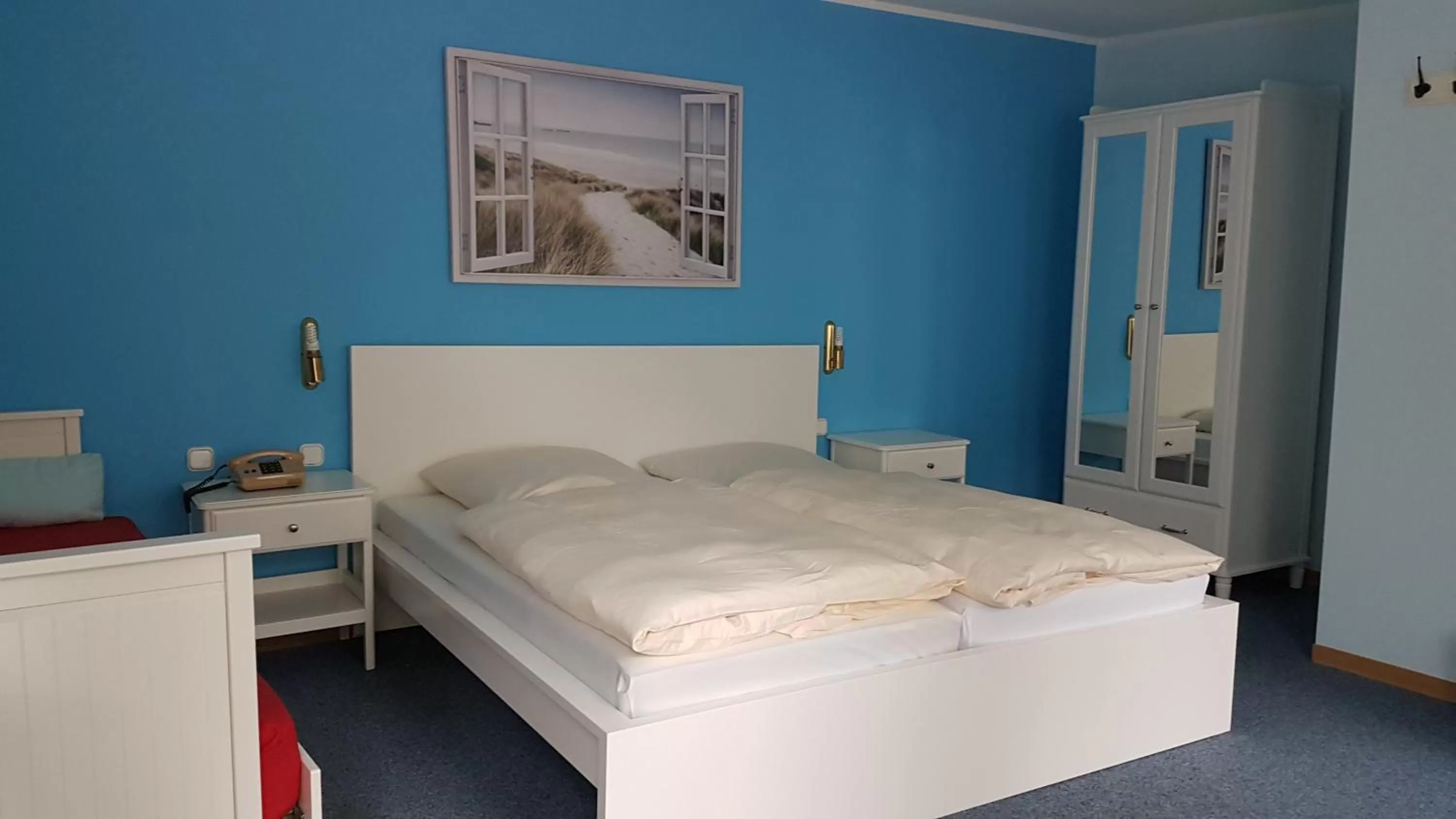 Bed in Hotel Heldt Dependance