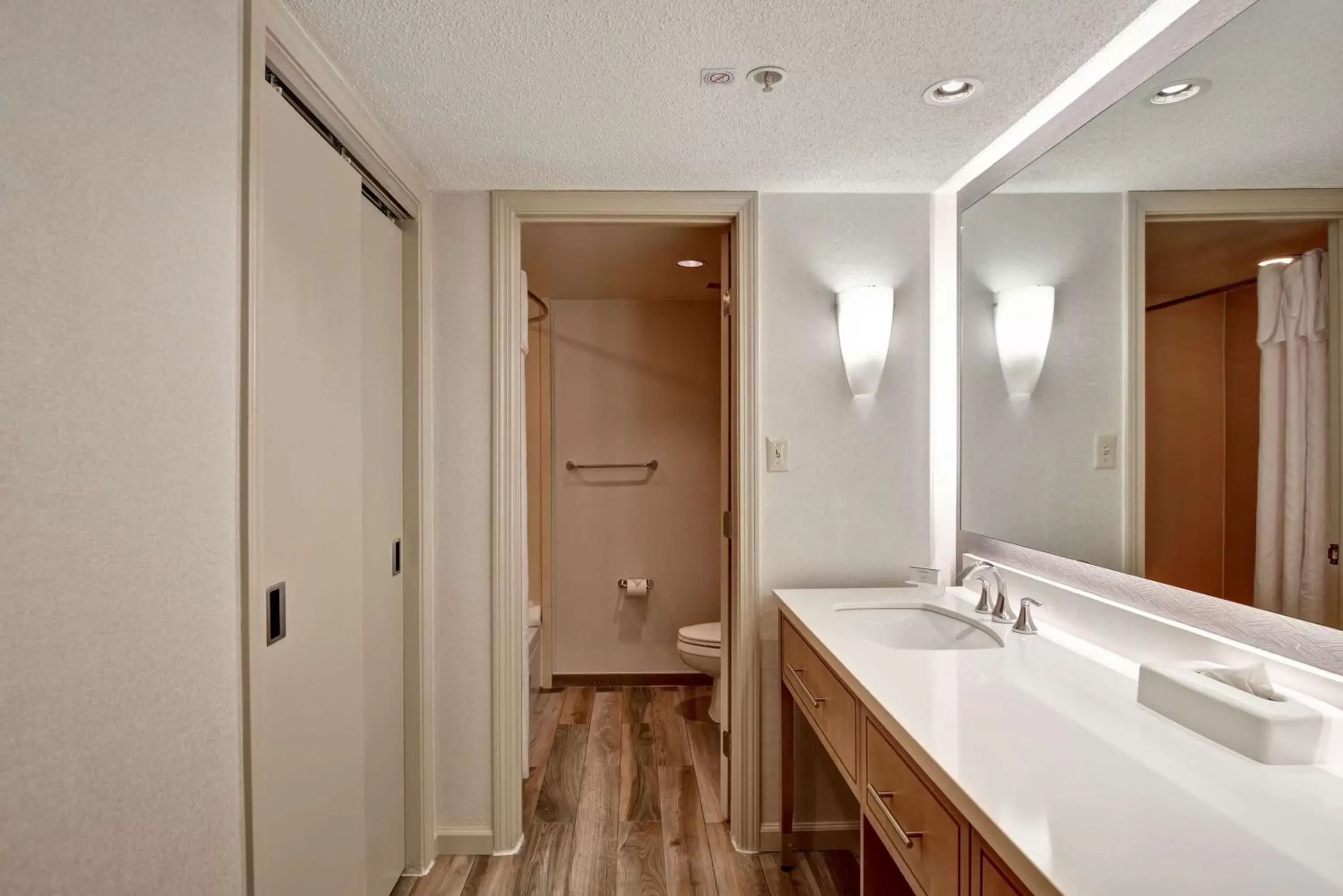 Living room, Bathroom in Homewood Suites Hartford/Windsor Locks