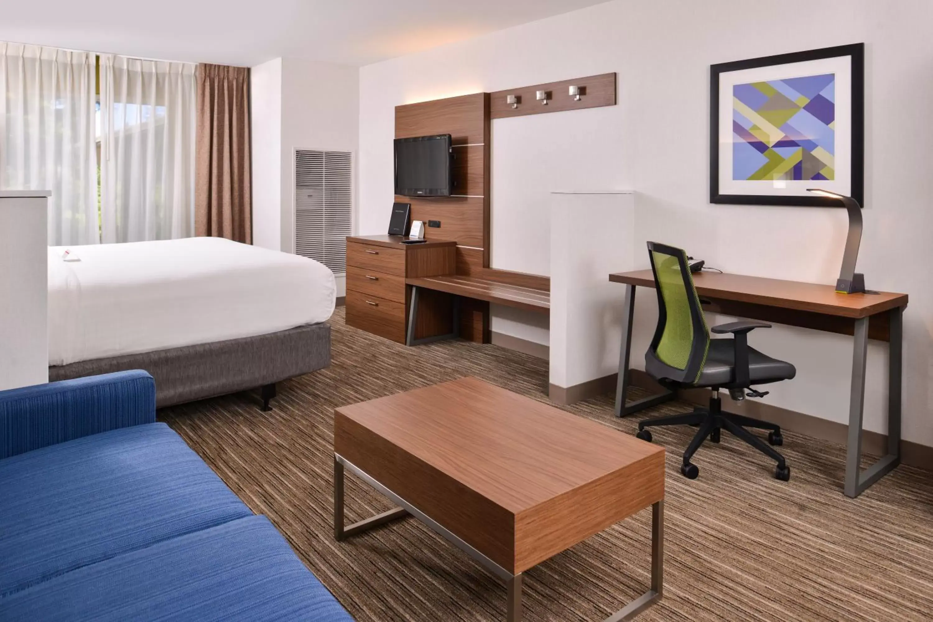 Photo of the whole room, TV/Entertainment Center in Holiday Inn Express Hotel & Suites Lacey, an IHG Hotel