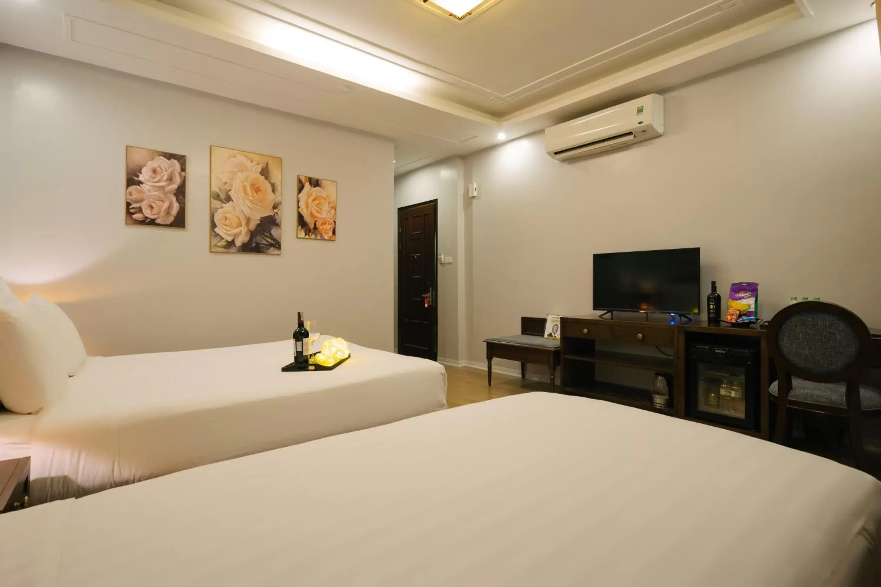 Bed in La Palm Hotel Bed in La Palm Hotel