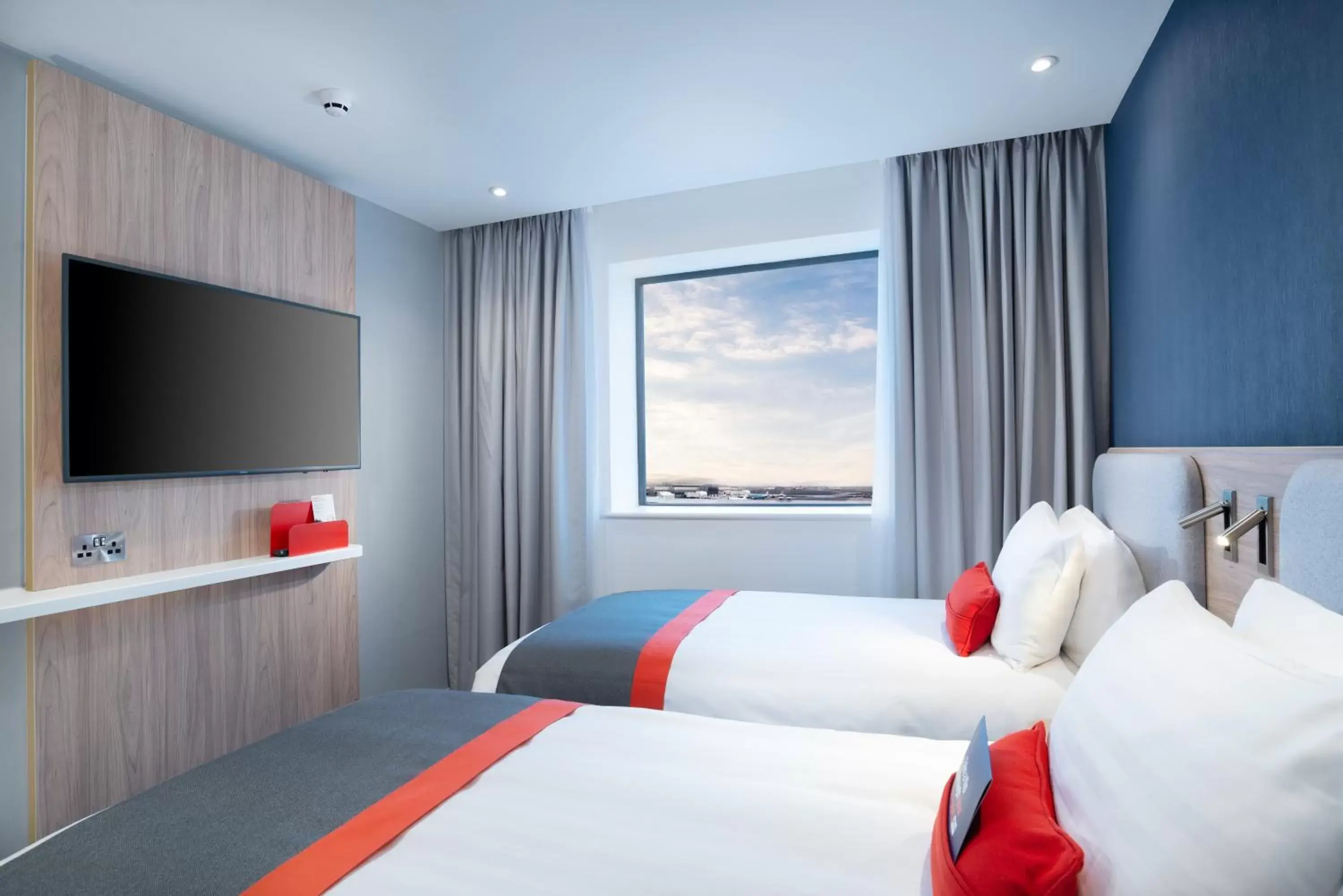 Bed in Holiday Inn Express - London Heathrow T4, an IHG Hotel