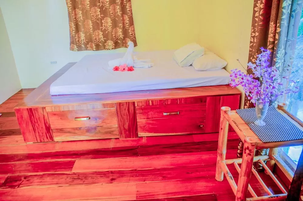 Bed in Camaya-an Paradise Beach Resort