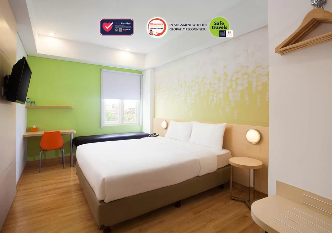 Bedroom in Zest Yogyakarta by Swiss-Belhotel International