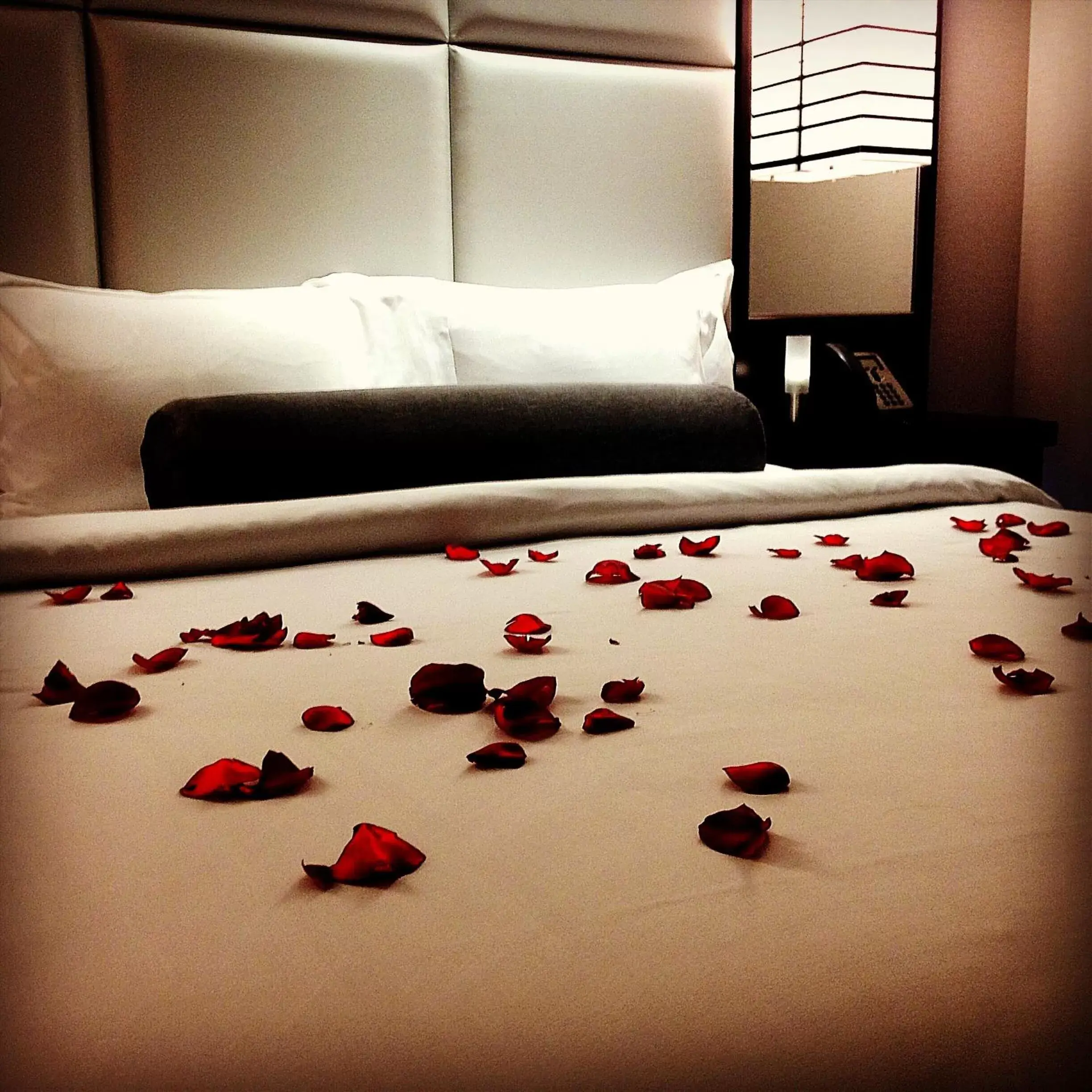 Bed in Ivy Boutique Hotel