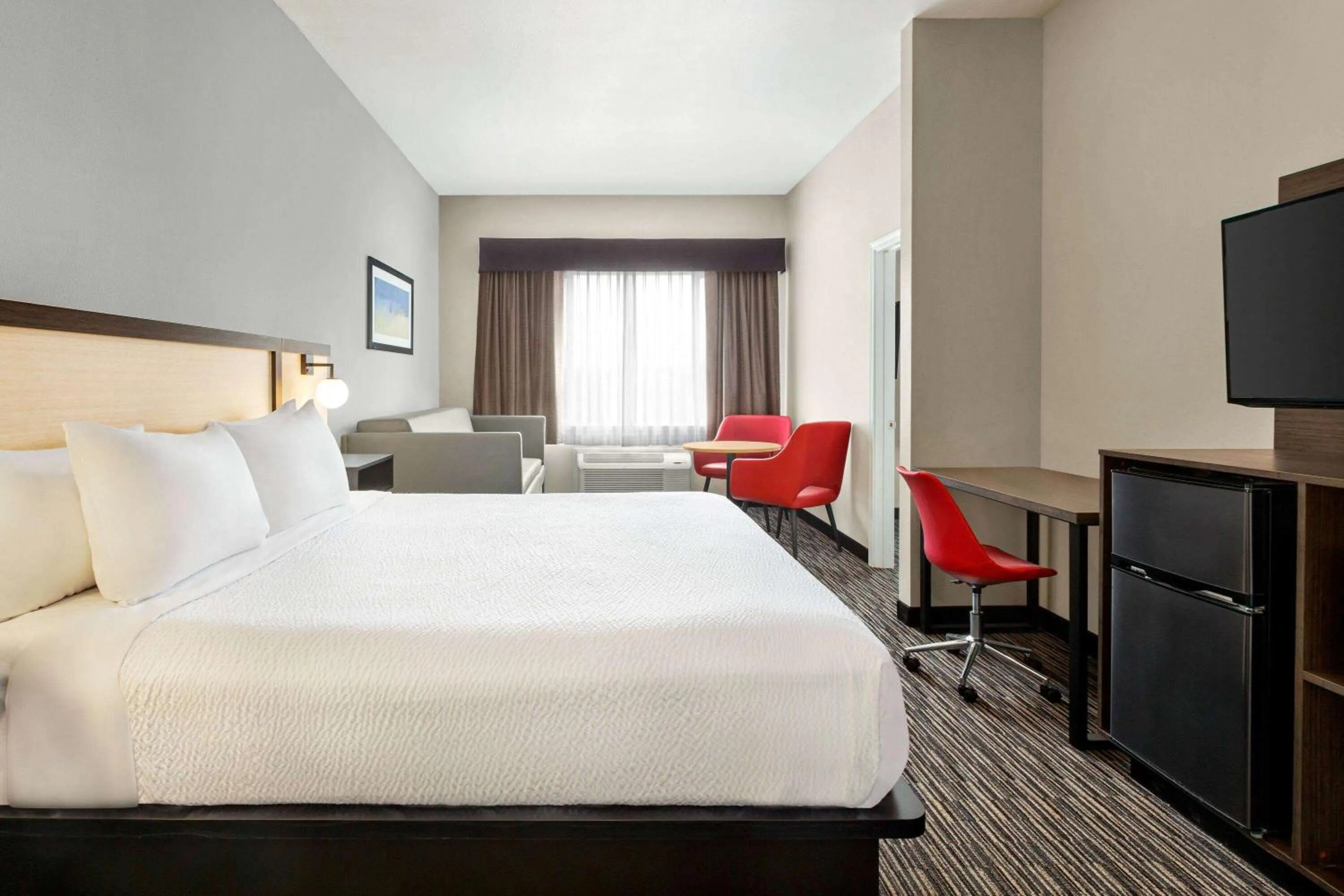 Bed in Ramada by Wyndham Marina