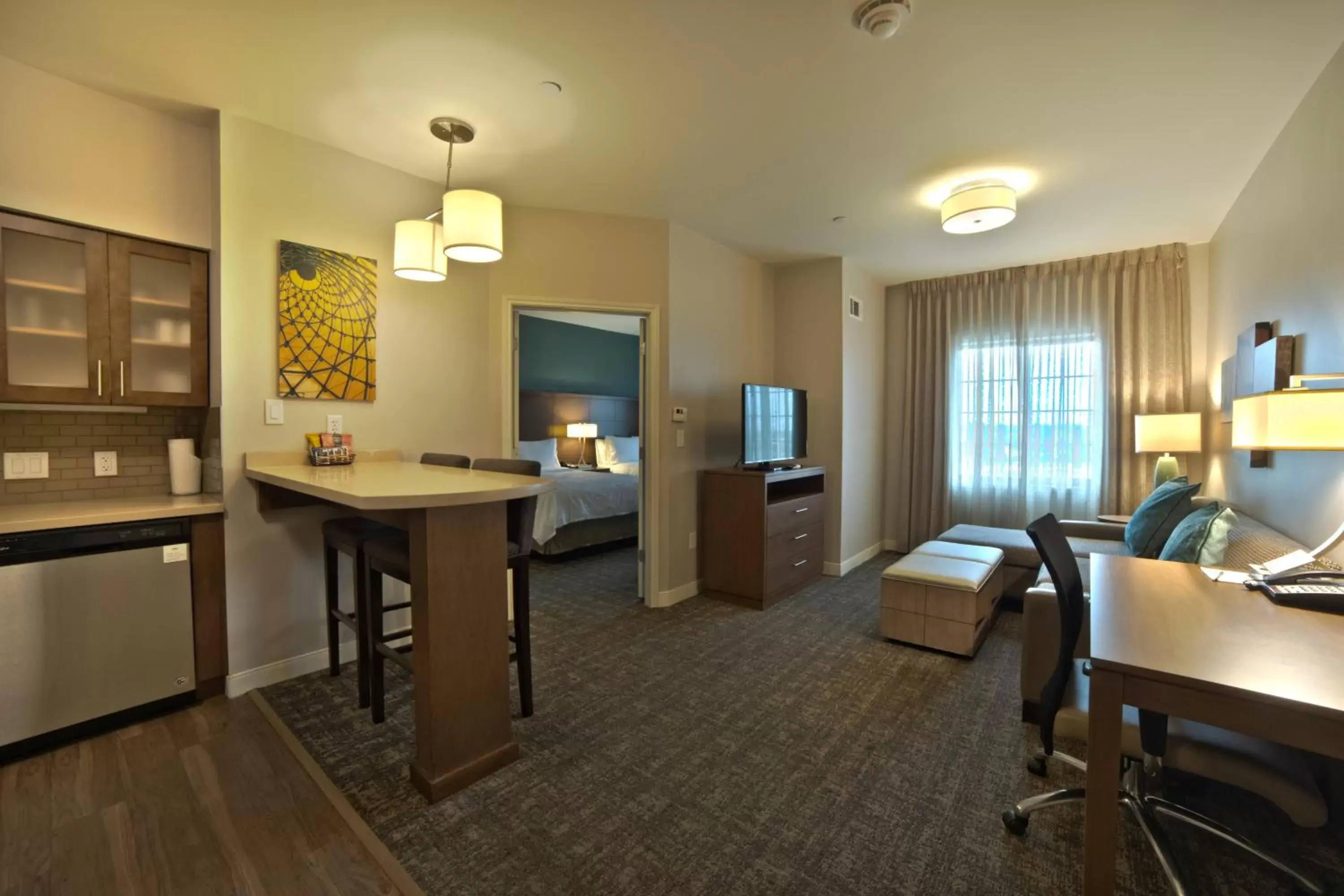 Living room, Dining Area in Staybridge Suites Houston - Humble Beltway 8 E, an IHG Hotel