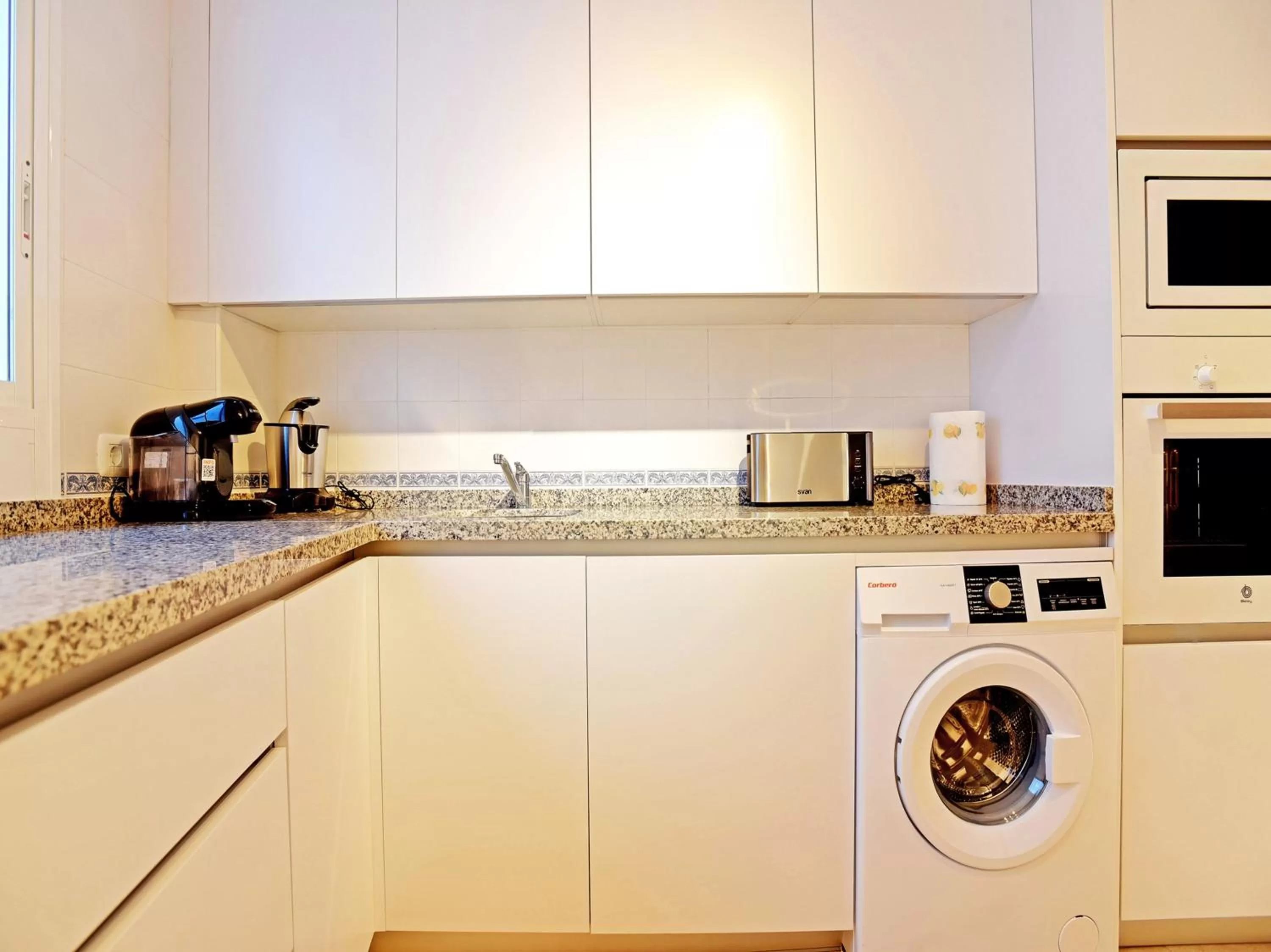 Kitchen or kitchenette in Apartamentos Santiago