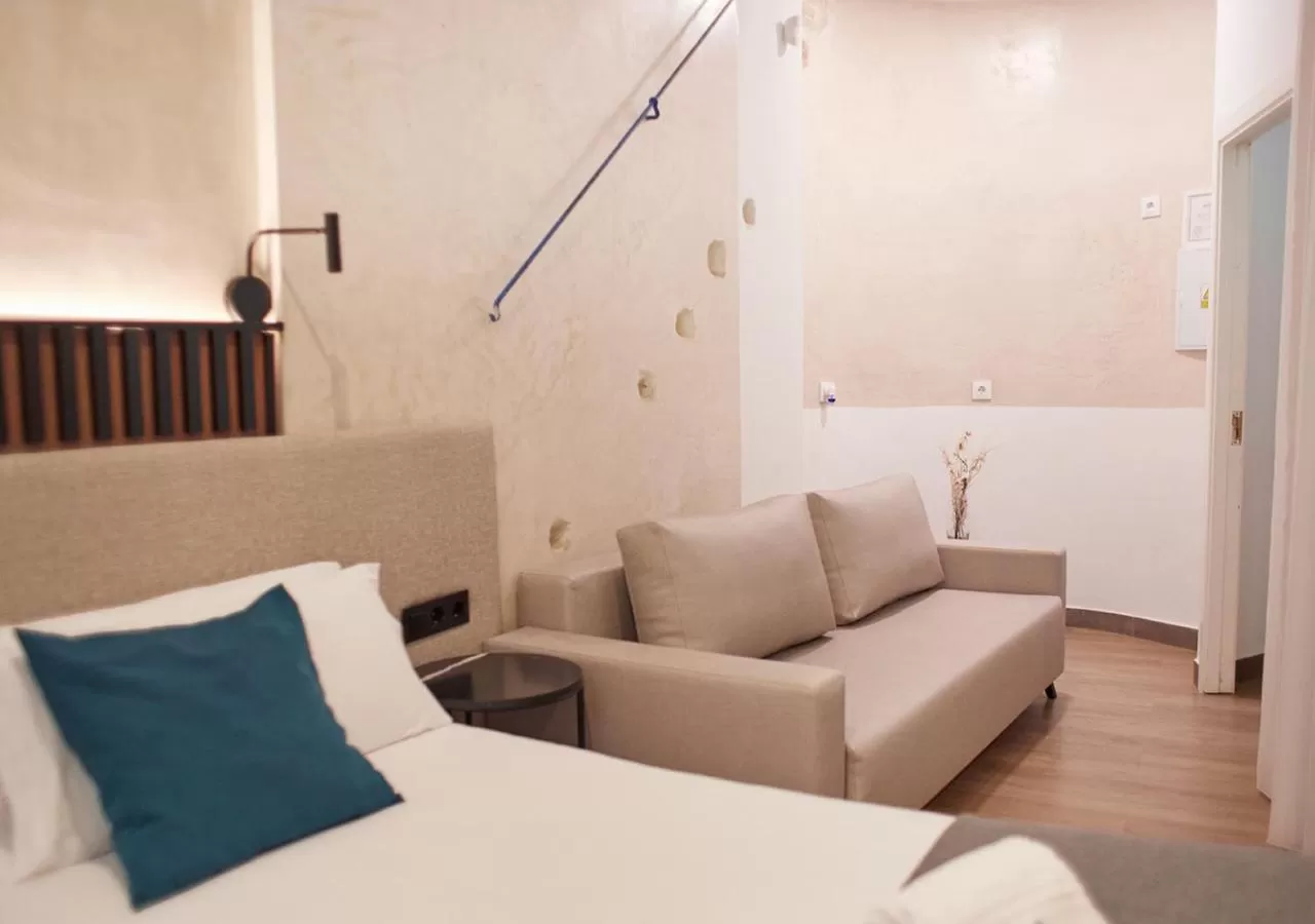 Bed in ISA Sevilla Suites