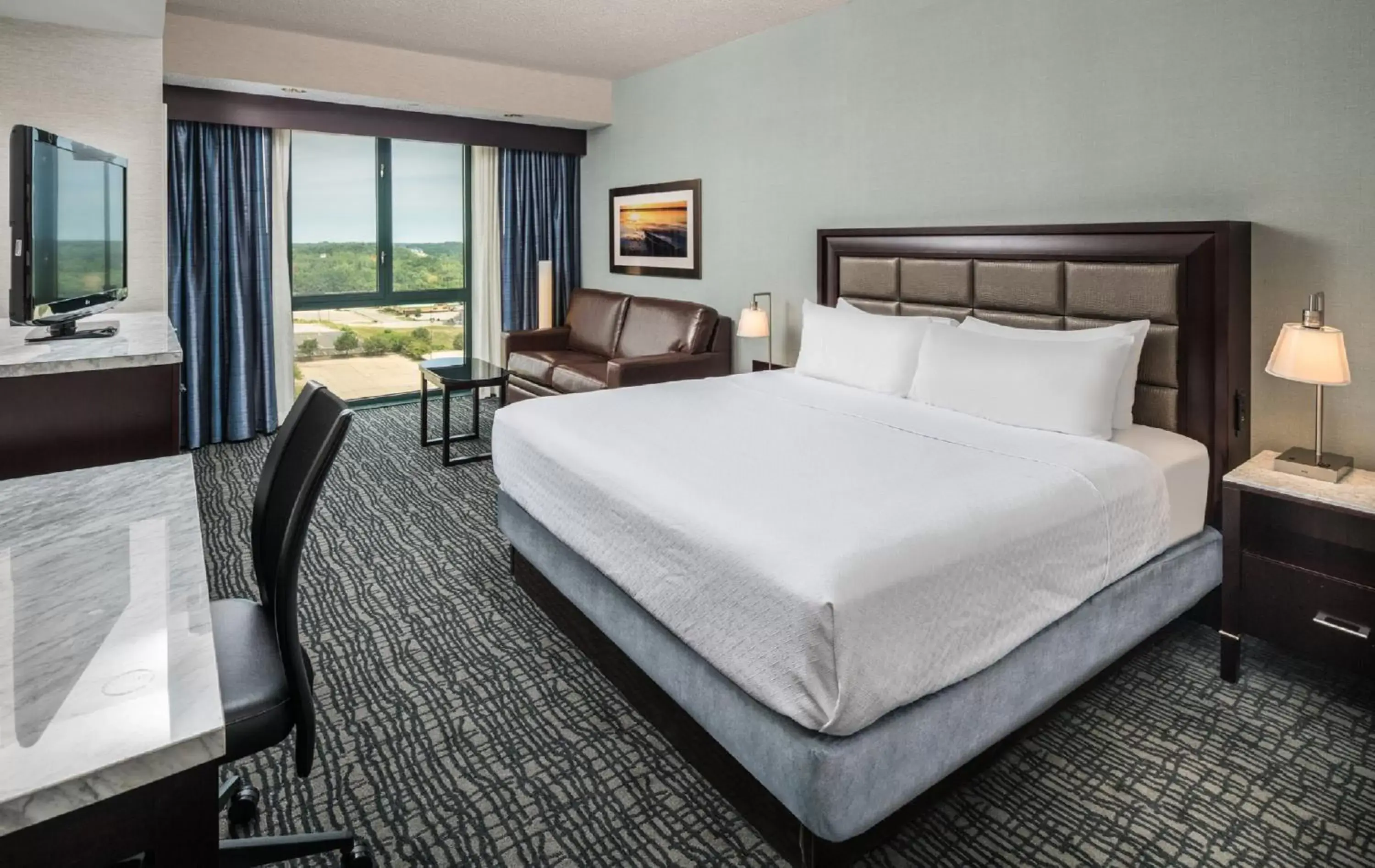 Photo of the whole room, Bed in Crowne Plaza Springfield Convention Center, an IHG Hotel