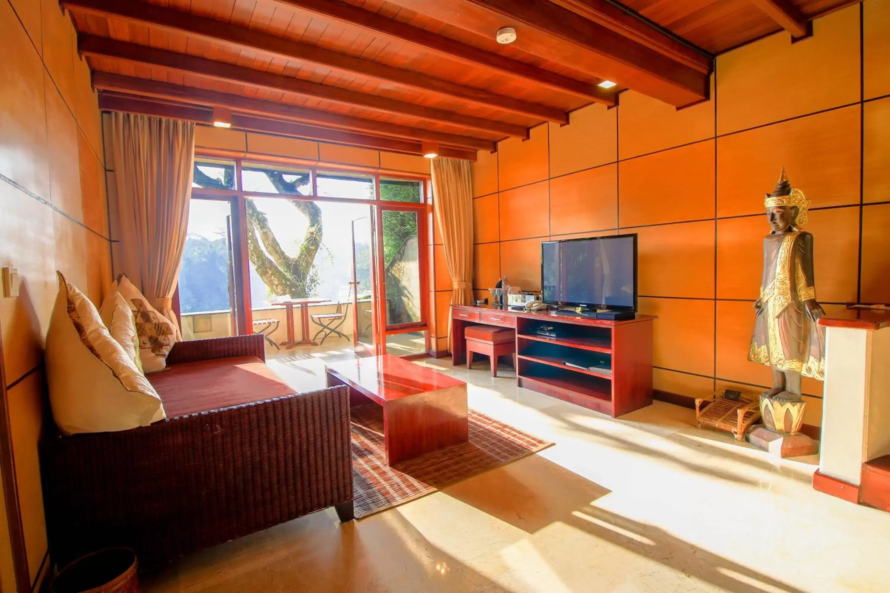 Living room, TV/Entertainment Center in Kupu Kupu Barong Villas and Tree Spa by L’OCCITANE