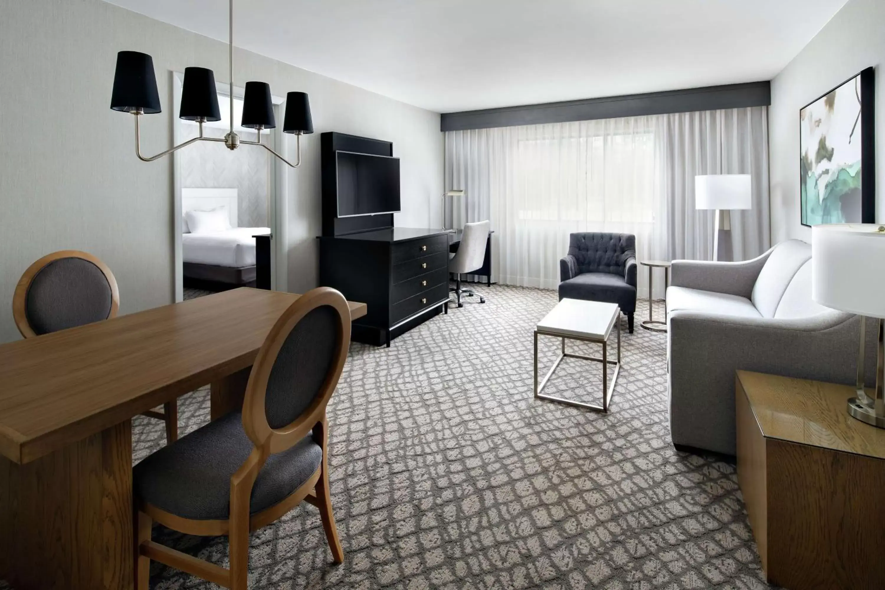 Bed, Seating Area in DoubleTree Suites by Hilton Charlotte/SouthPark