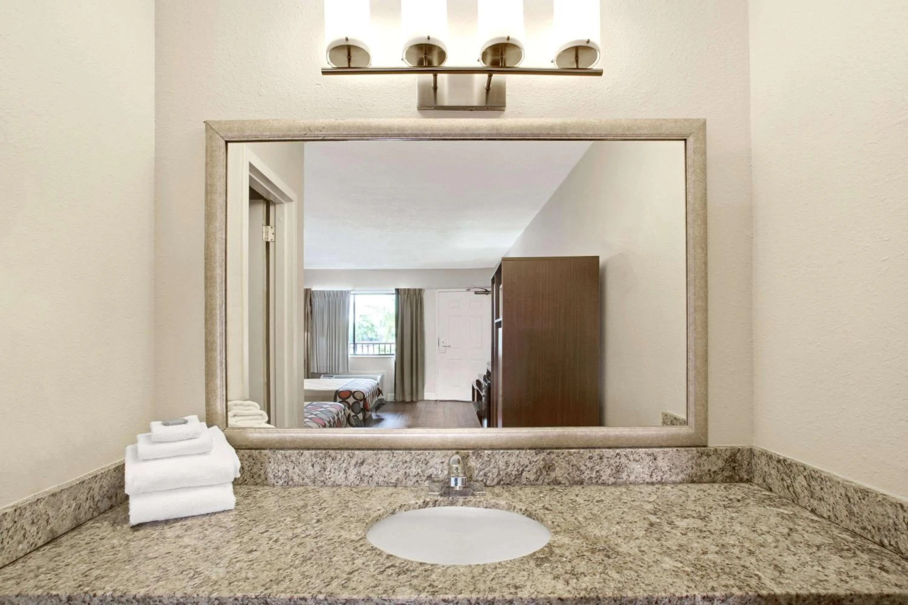 Bathroom in Super 8 by Wyndham Orlando International Drive