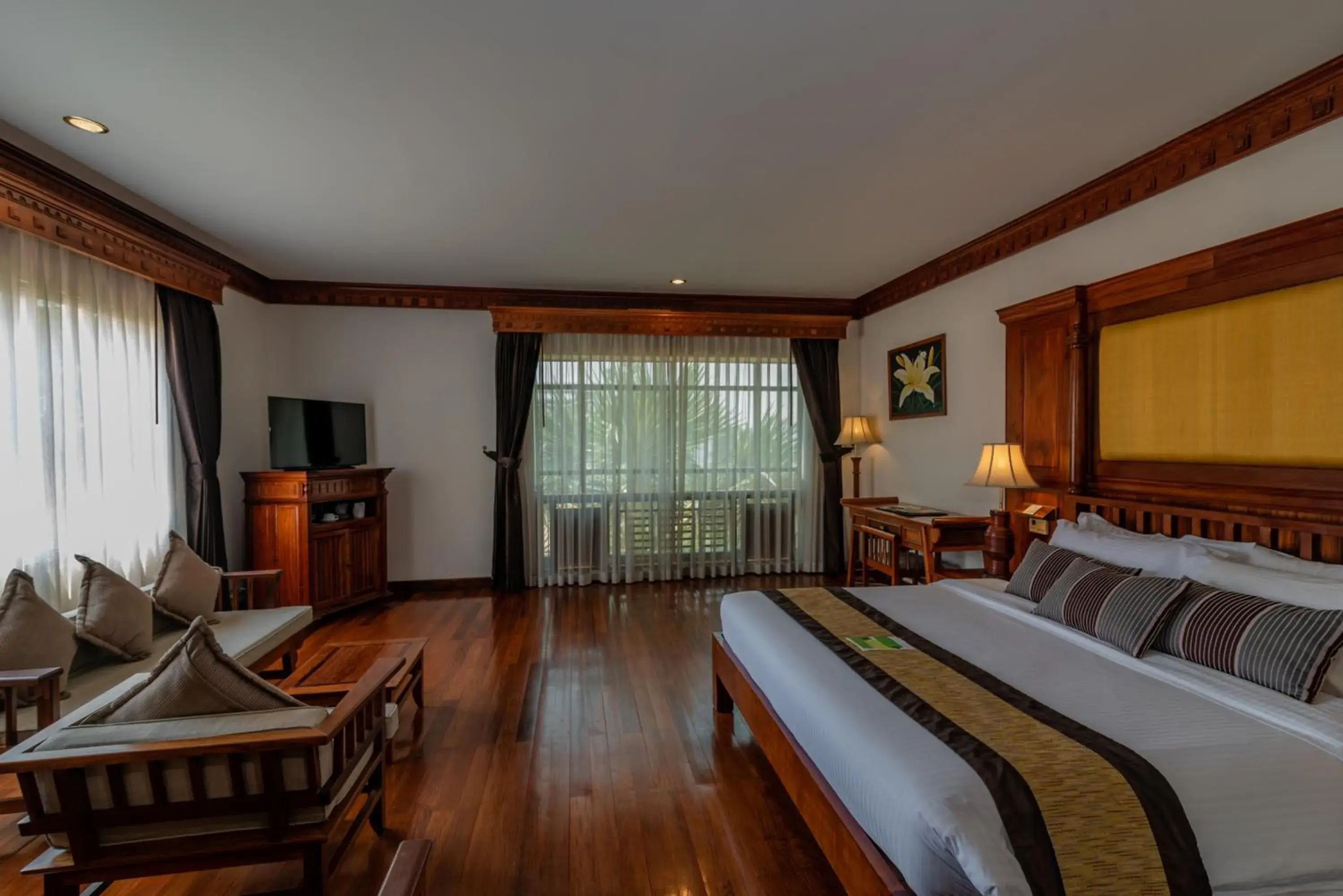 Bed in Empress Angkor Resort & Spa