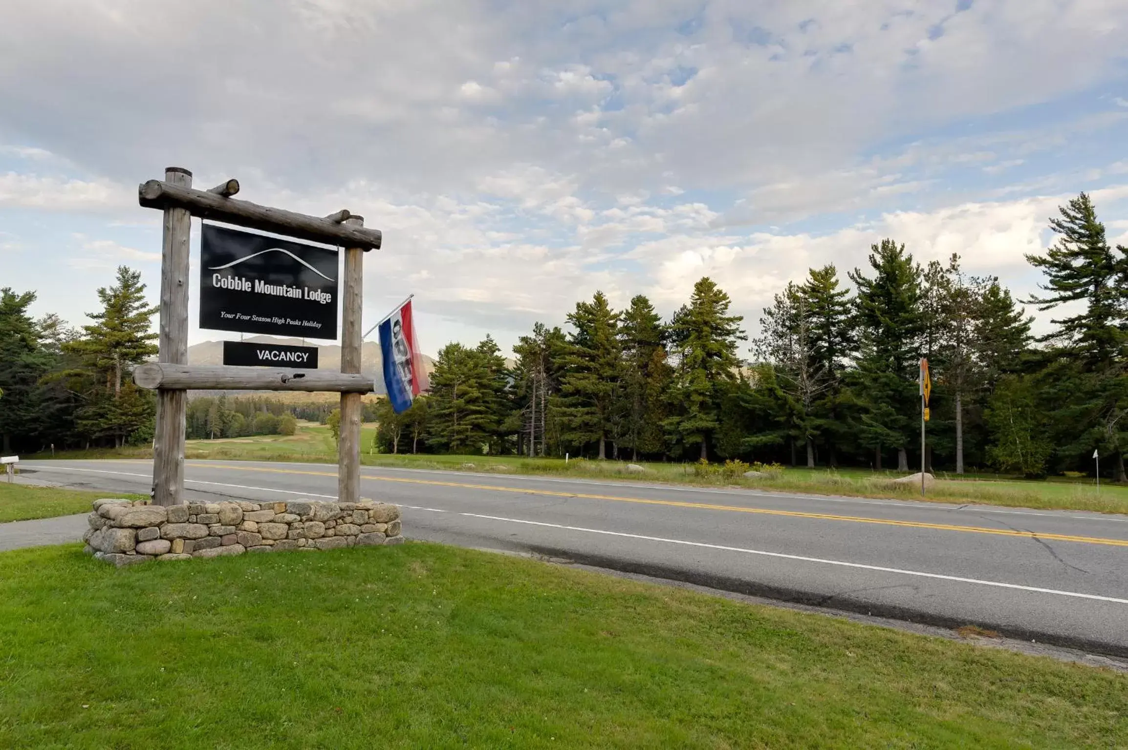 Property logo or sign in Cobble Mountain Lodge