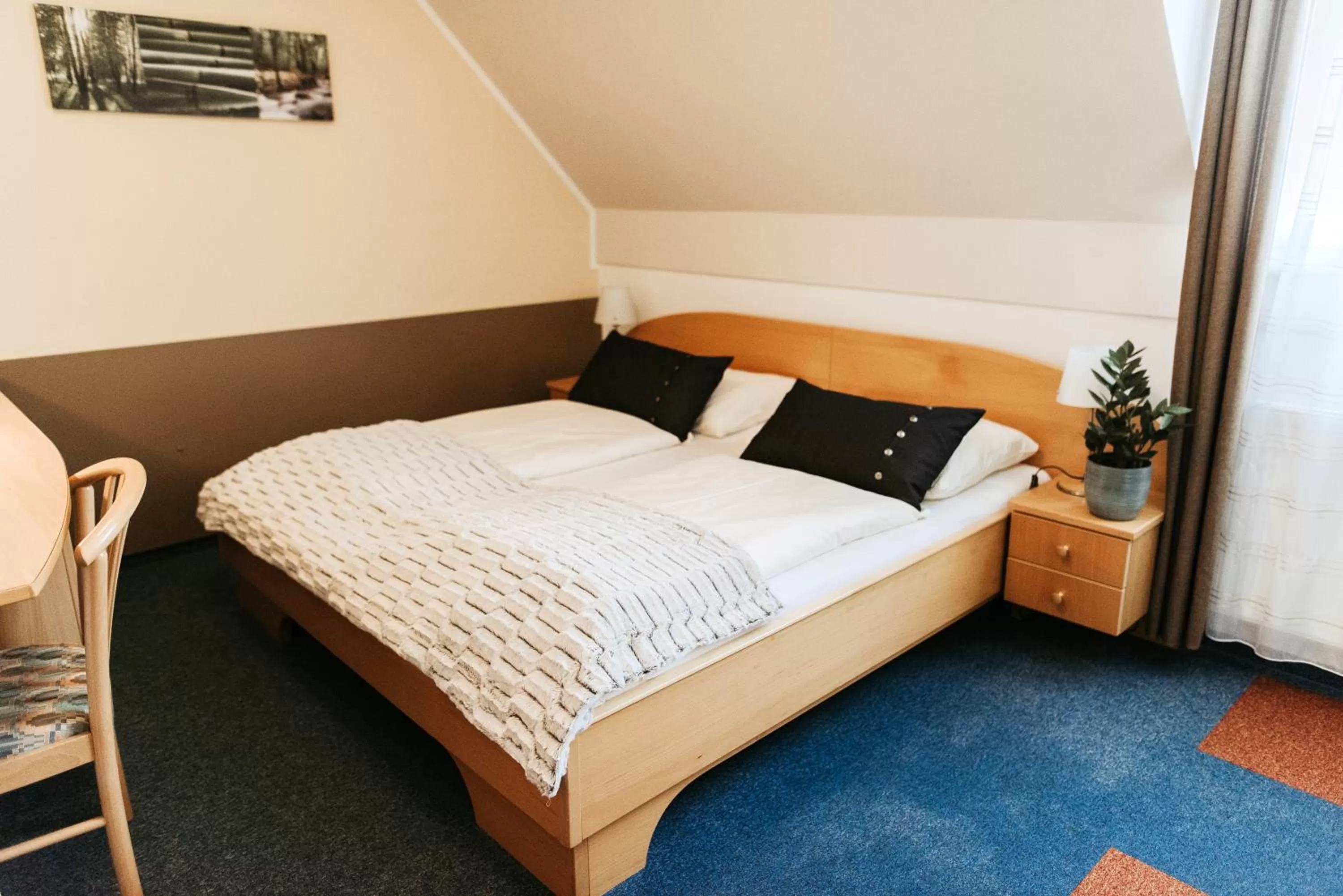 Bed in Restaurant Gästehaus Feldkirchen