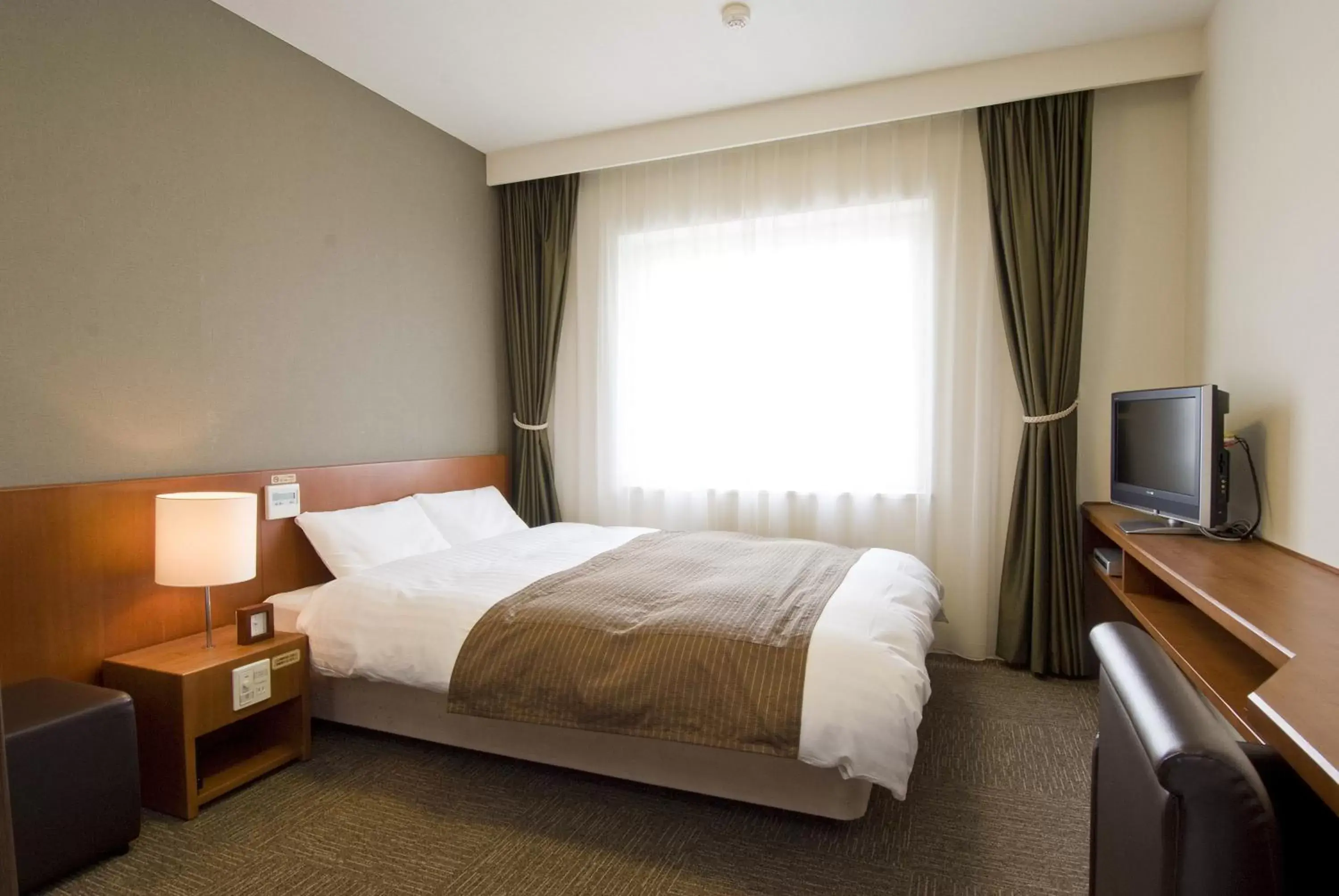 Photo of the whole room, Bed in Dormy Inn Wakkanai