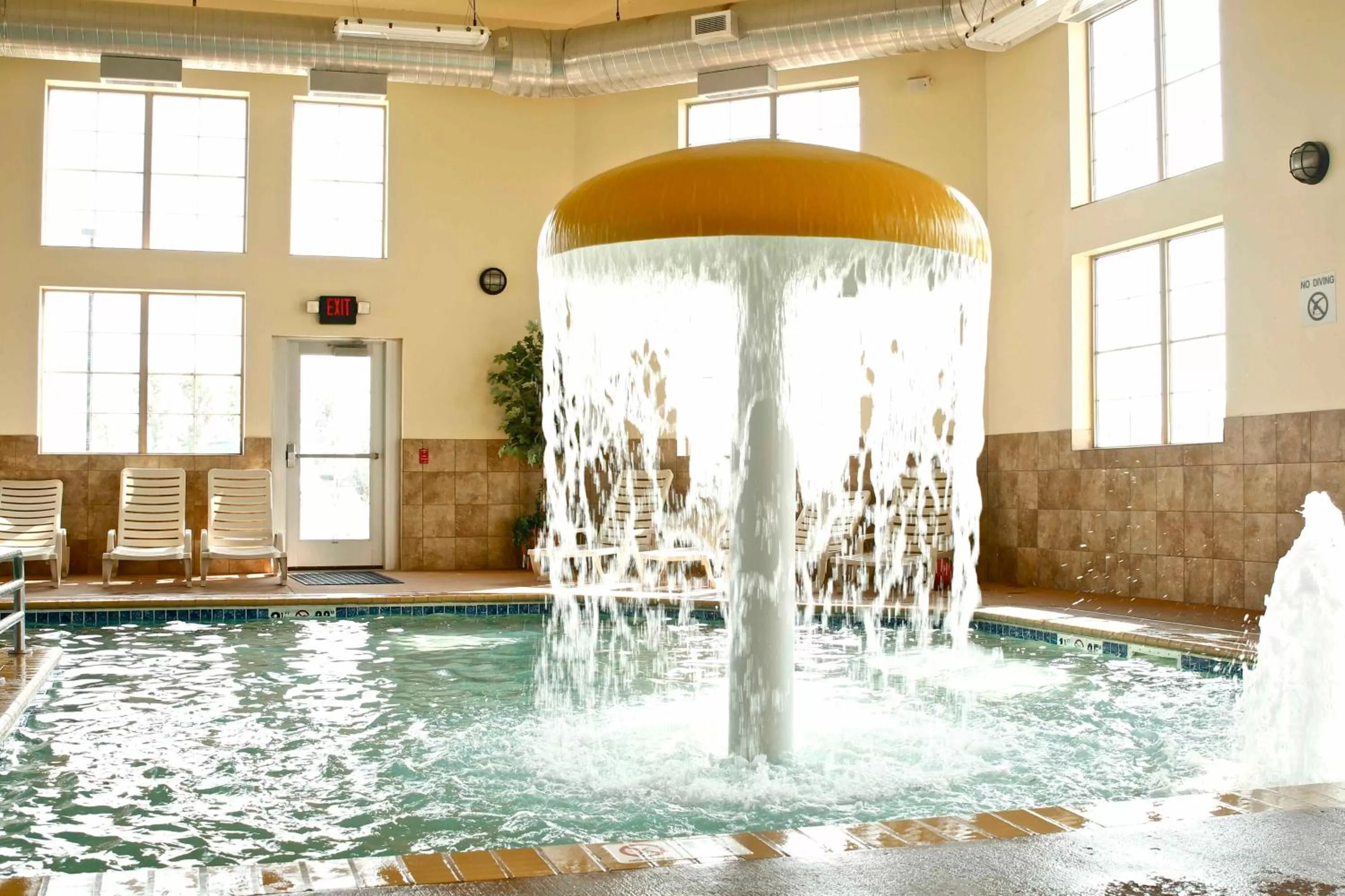 Swimming pool in AmericInn by Wyndham Fargo Medical Center