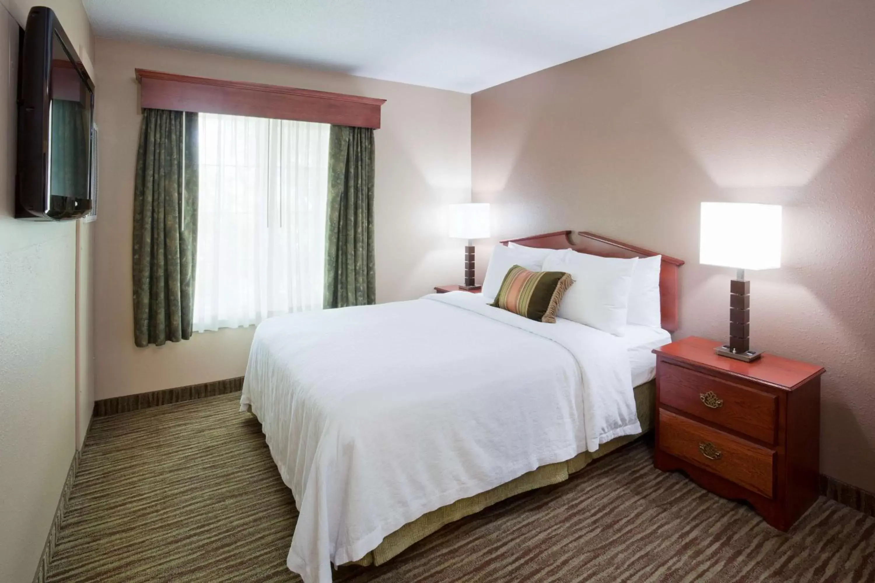 Bed in GrandStay Residential Suites Hotel - Eau Claire